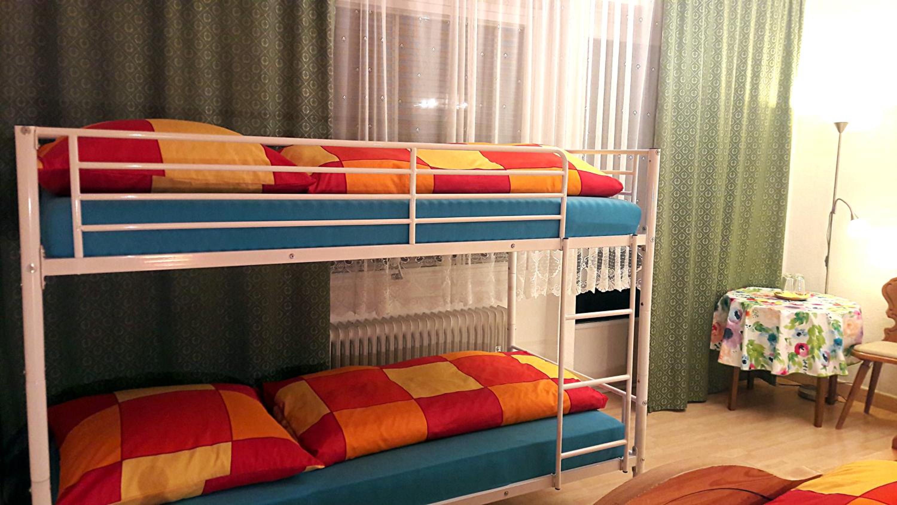 Quadruple Room with Balcony - Photo 11