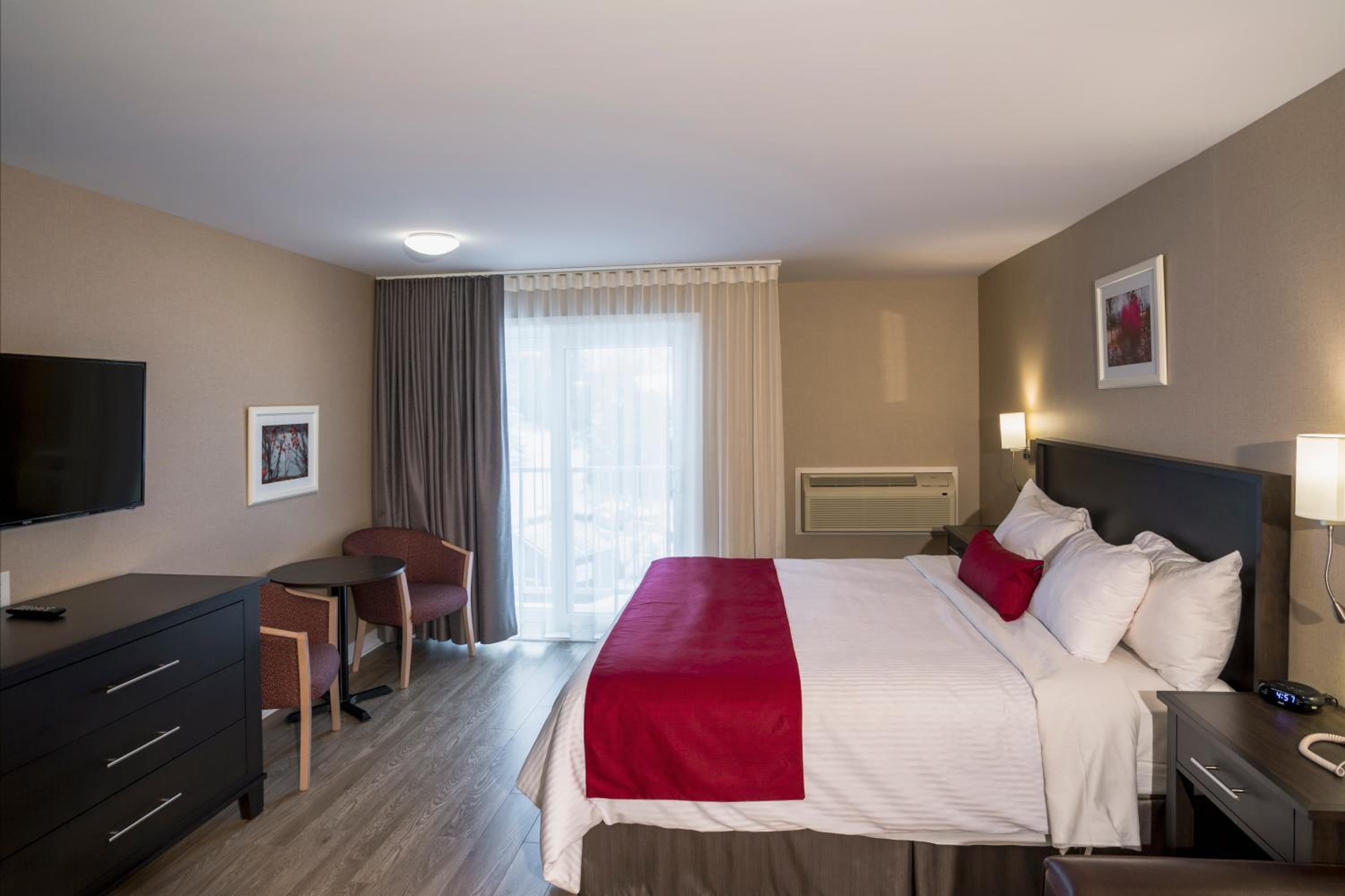 King Room - King Bed and Double-size Sofa Bed with Wood Floor