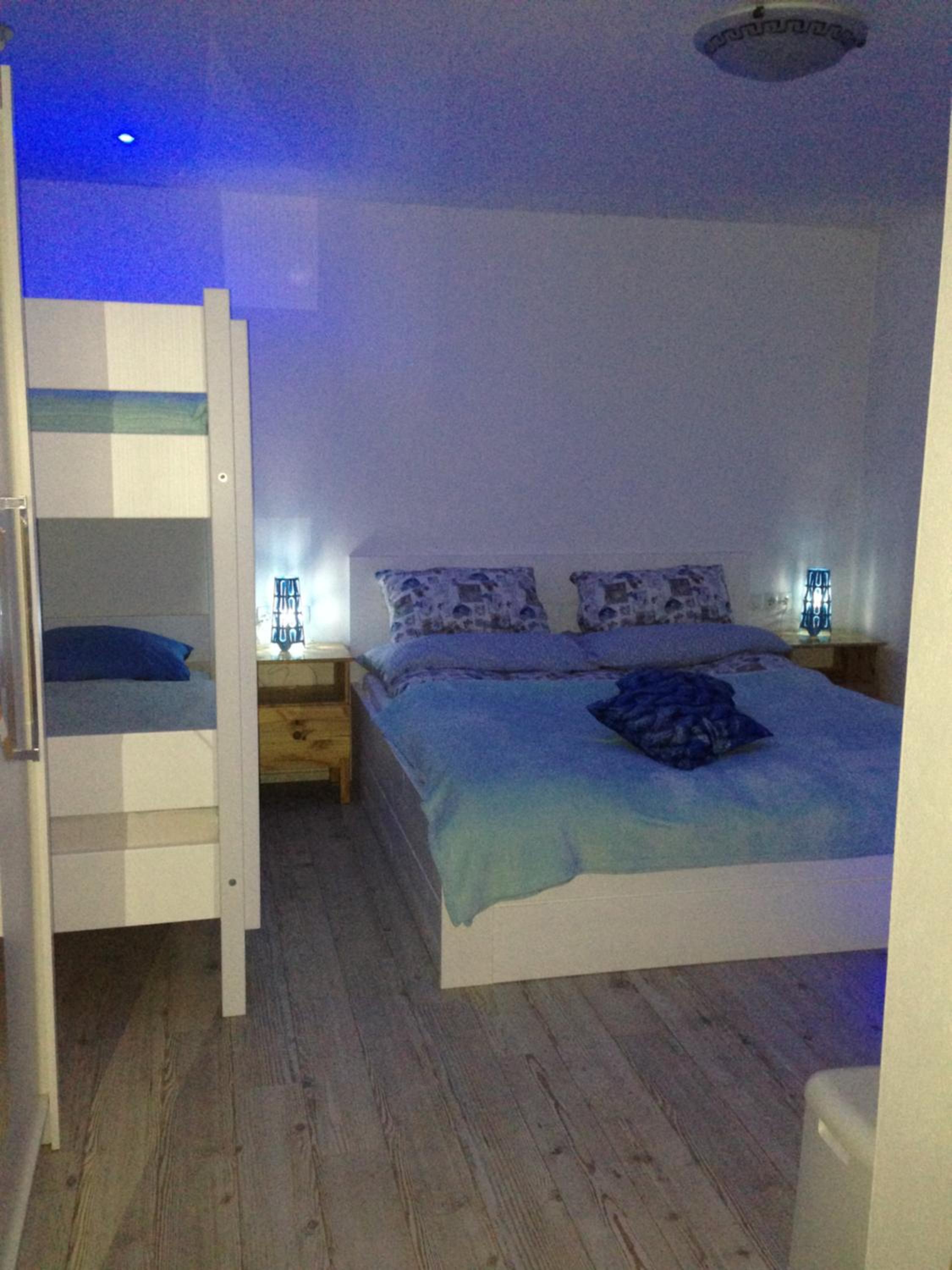 Quadruple Room with Balcony - Photo 1