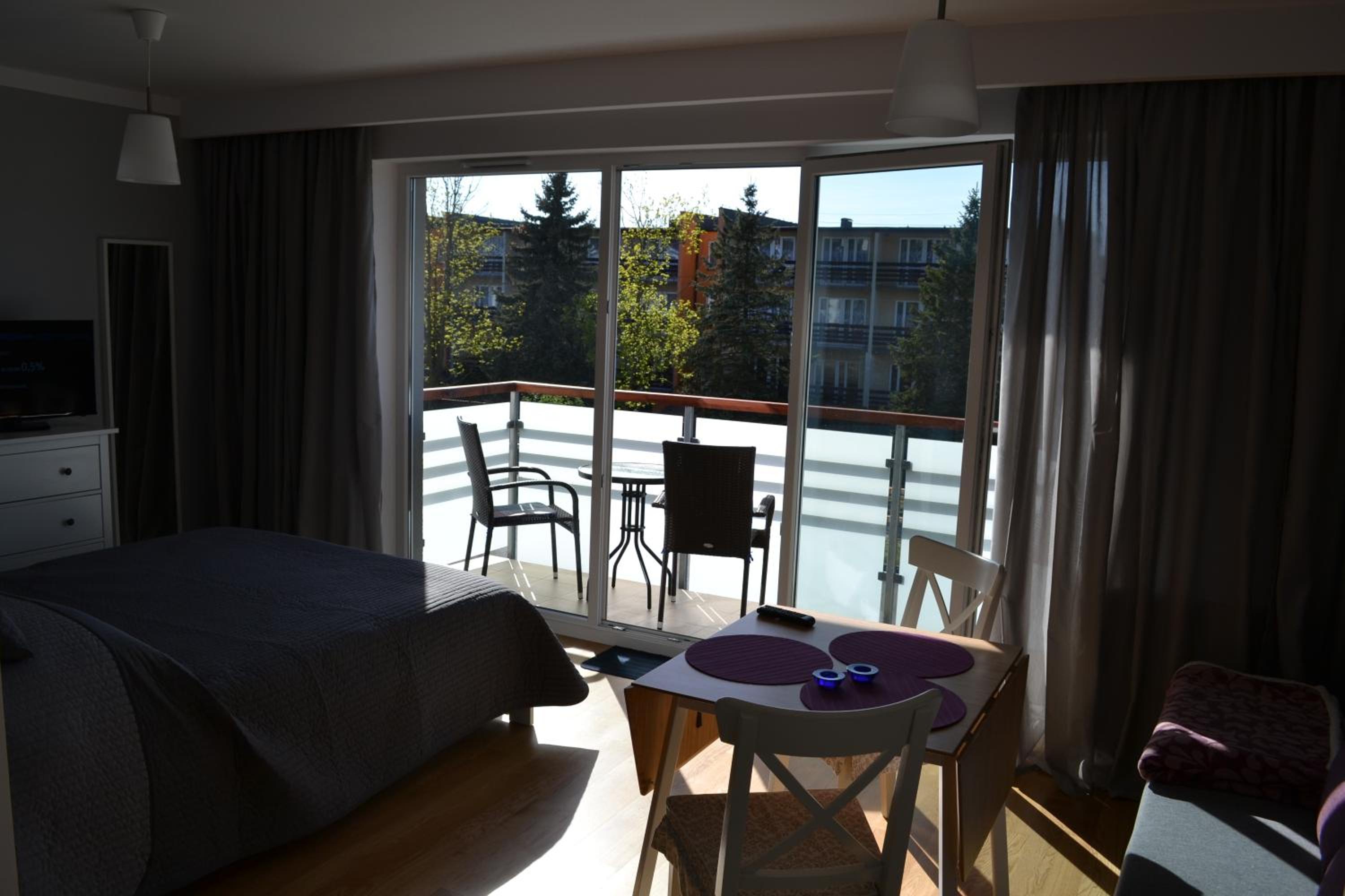 Apartment with Balcony - Photo 2