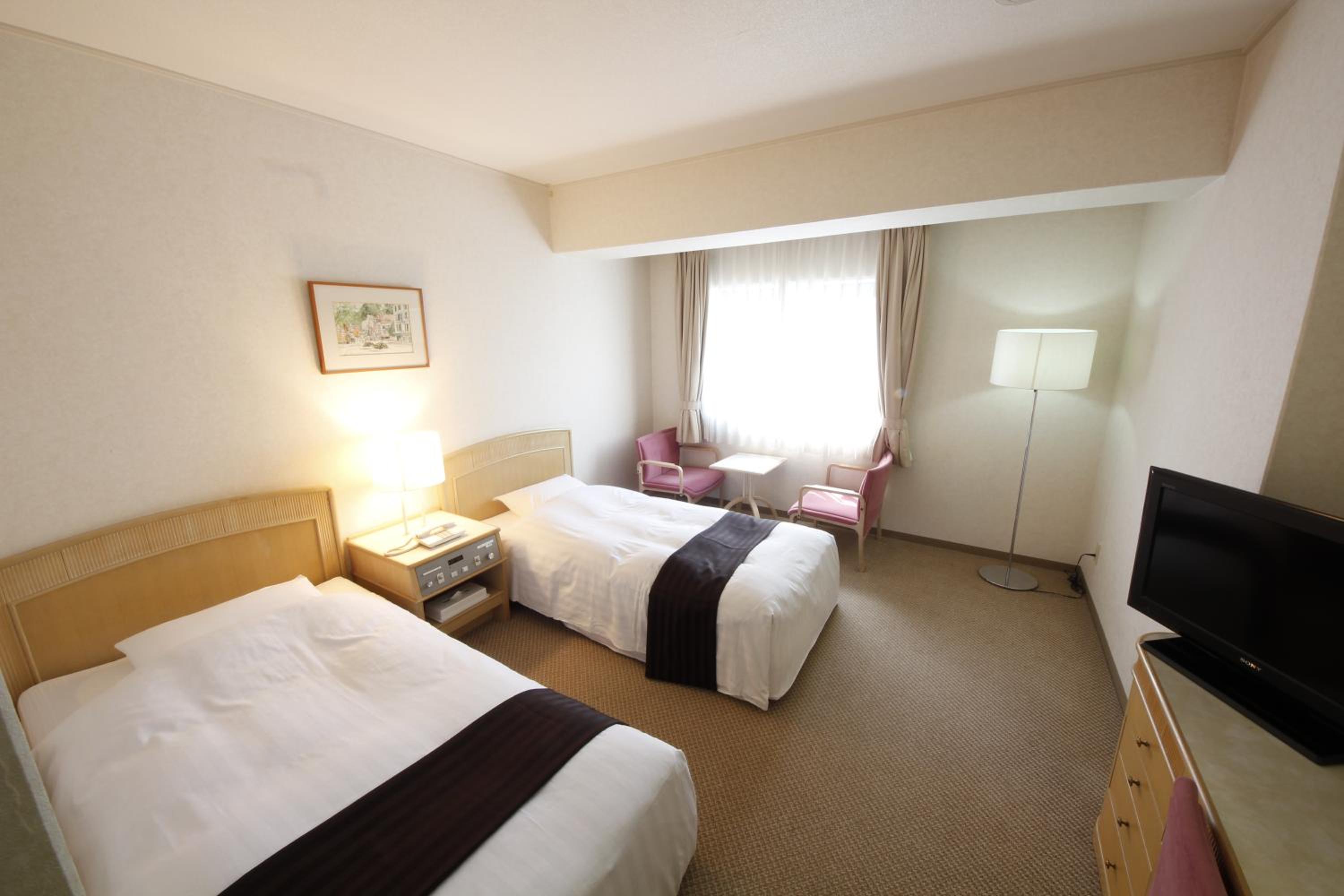 Twin Room - Photo 2