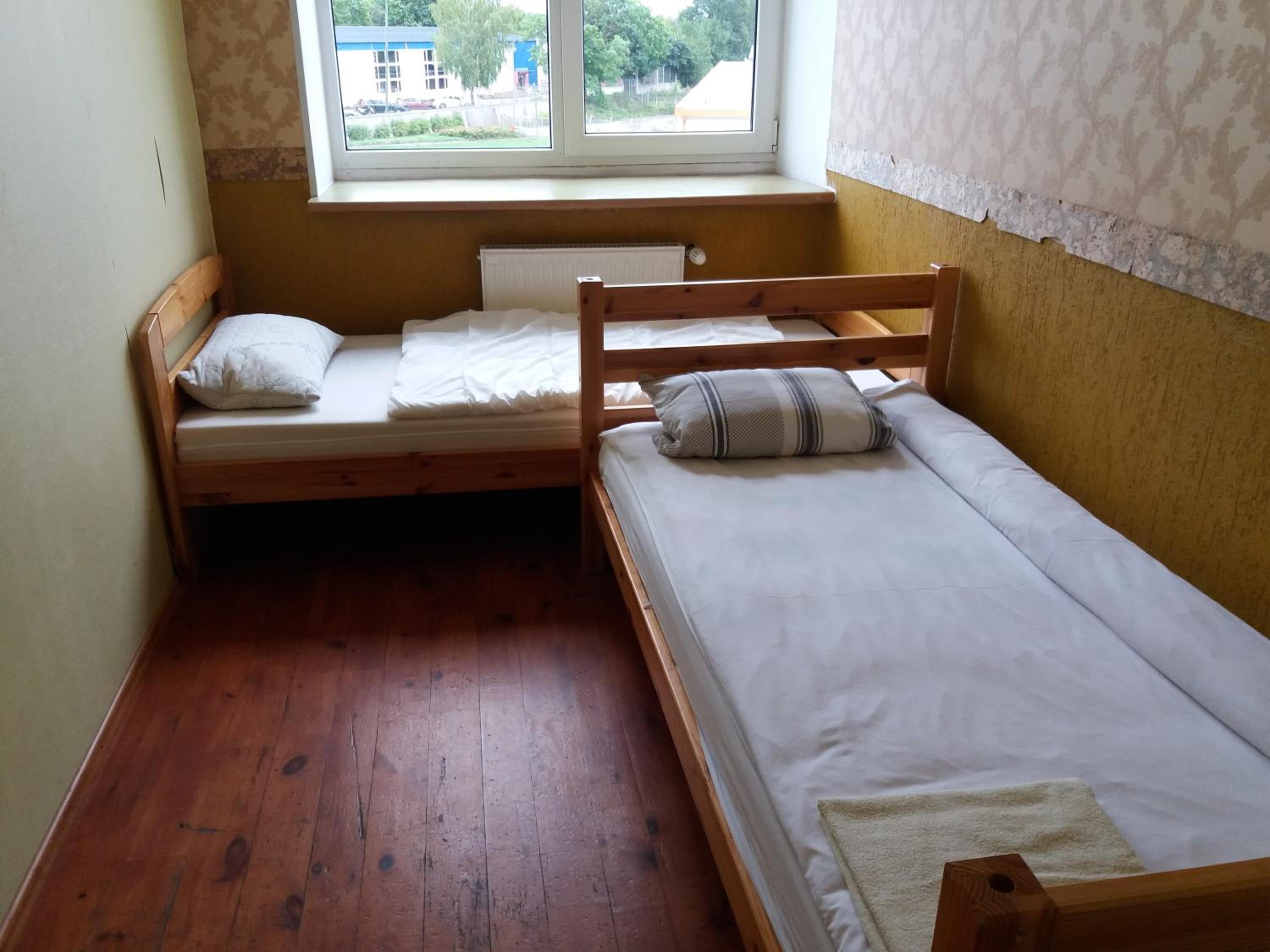 Bed In 2-Bed Dormitory Room With Shared Bathroom