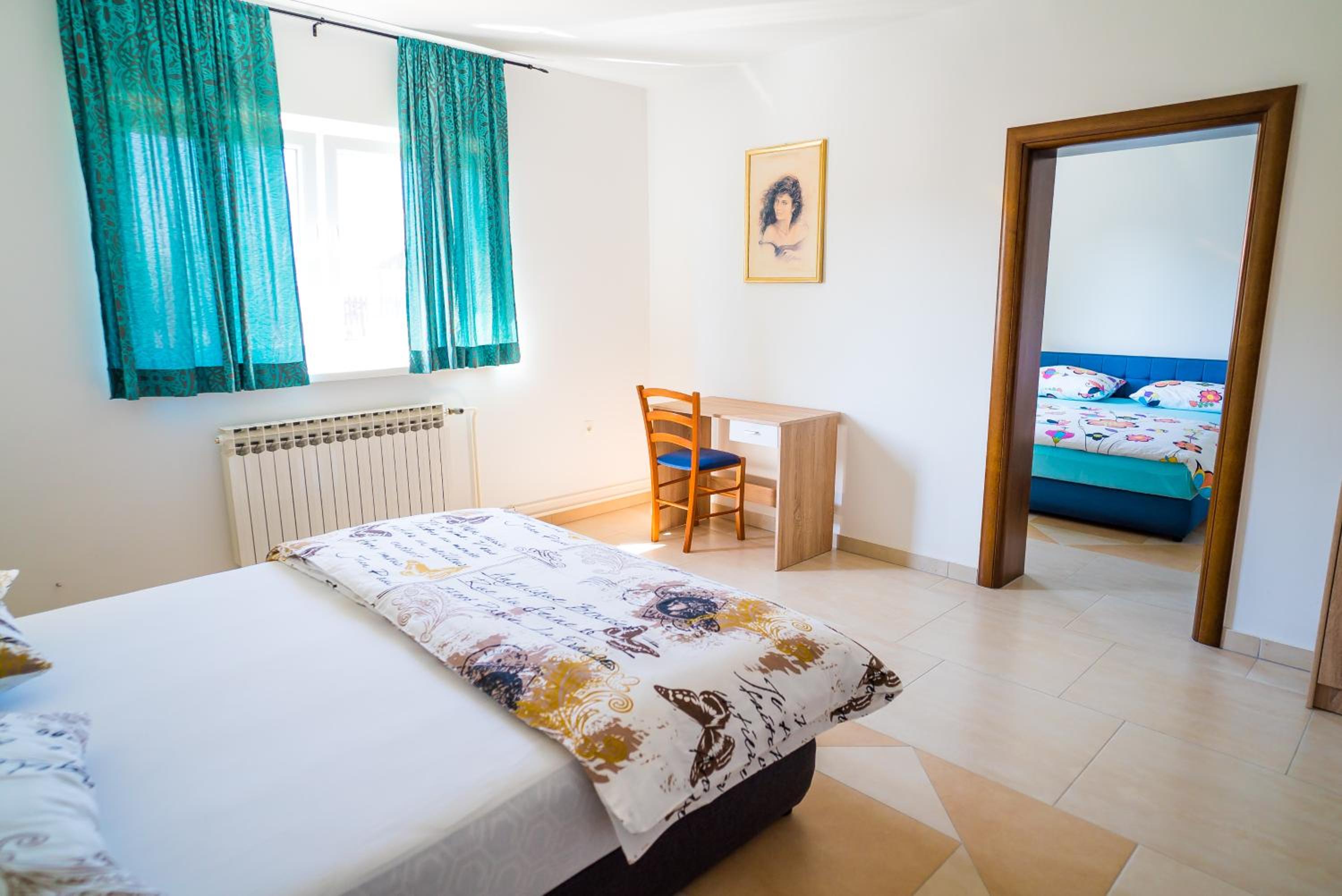 Three-Bedroom Apartment - Photo 2