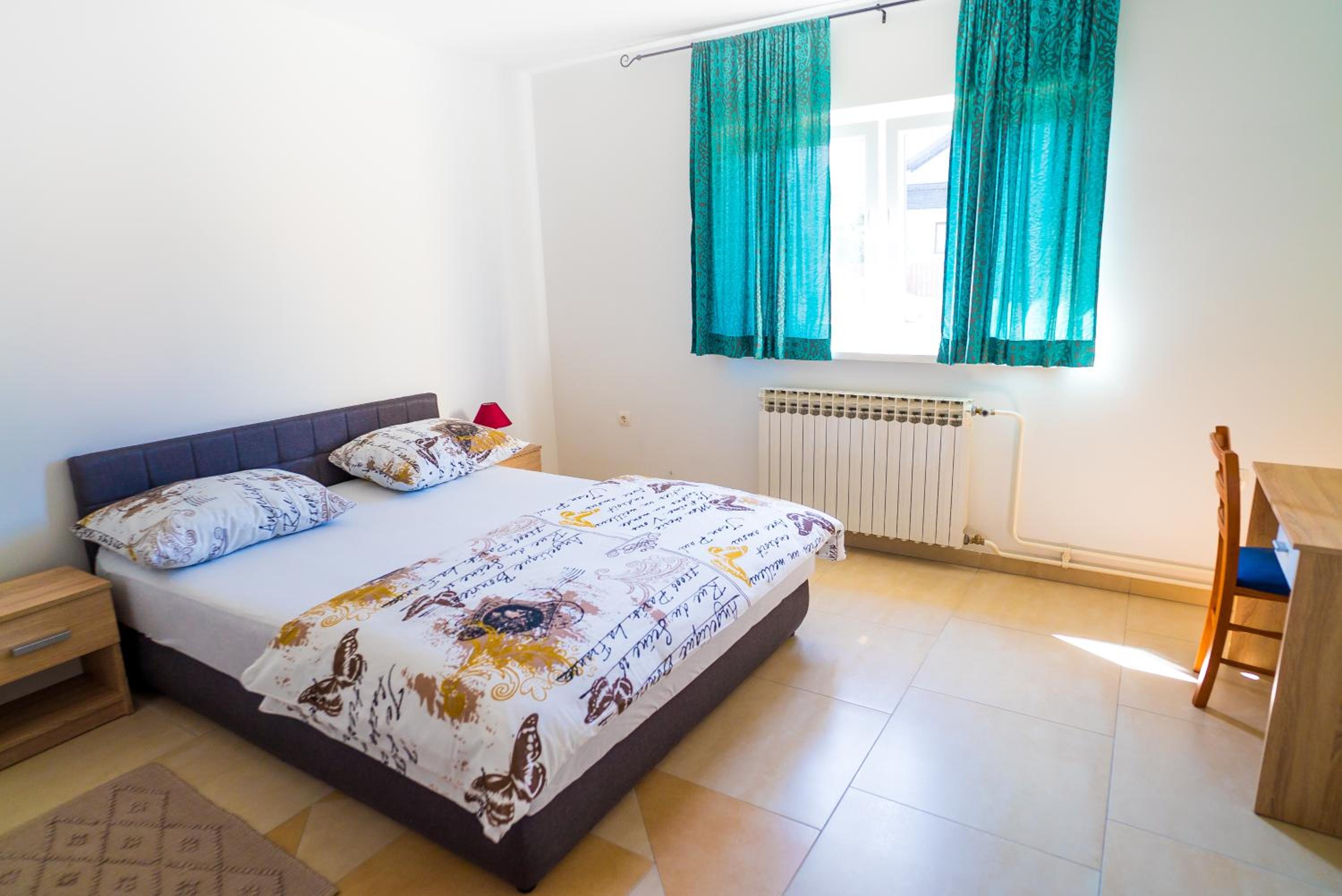 Three-Bedroom Apartment - Photo 12