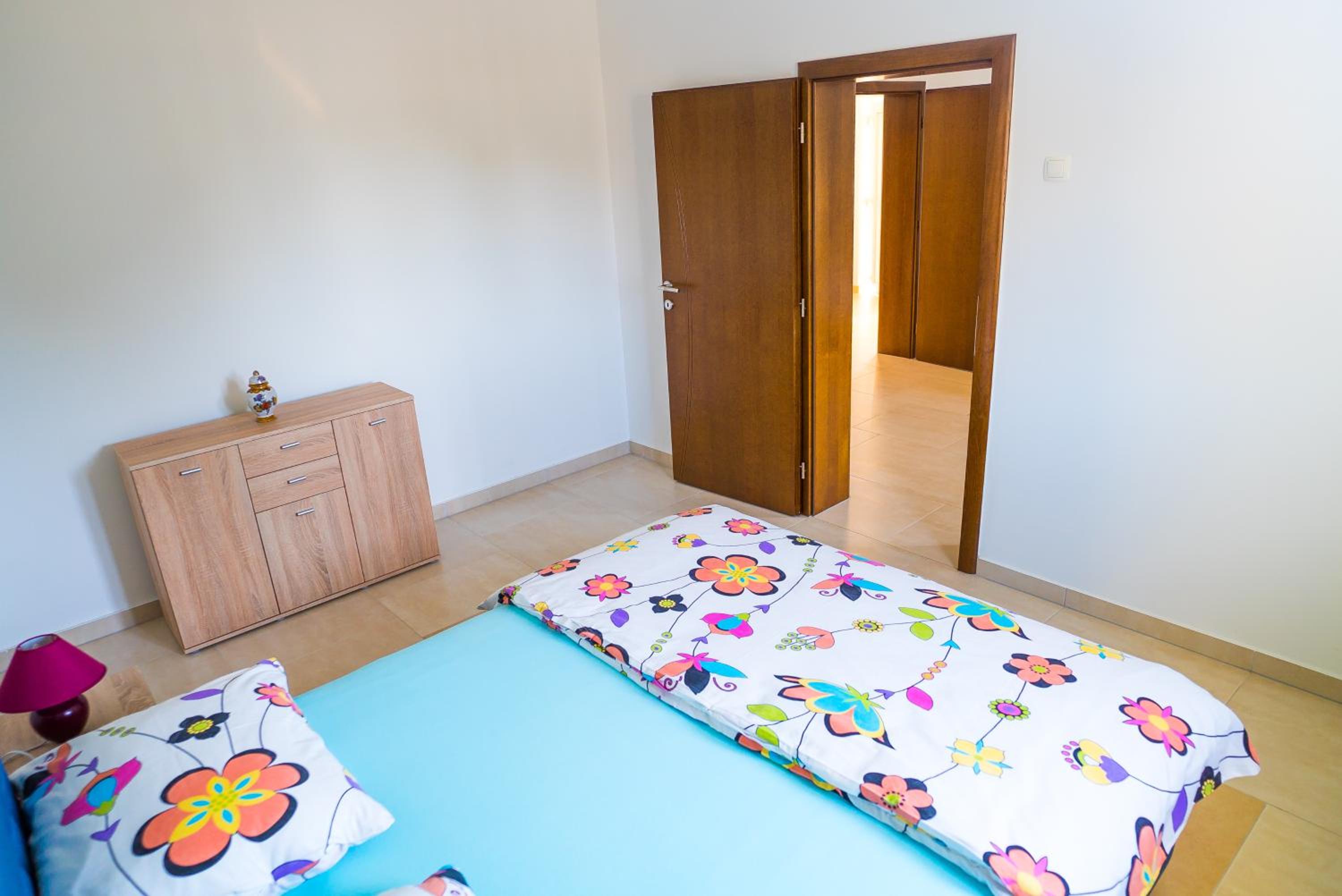 Three-Bedroom Apartment - Photo 13