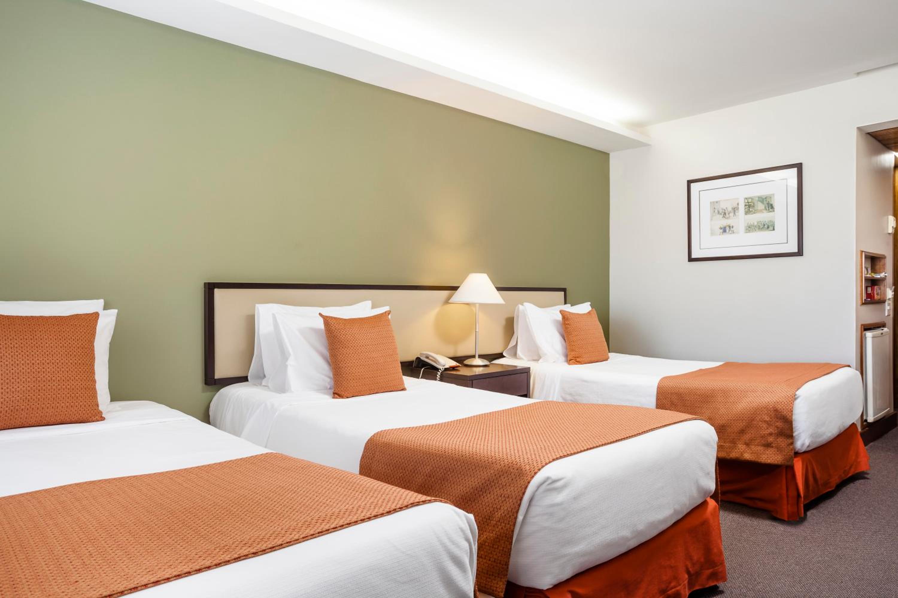 Classic Triple Room with Side Sea View