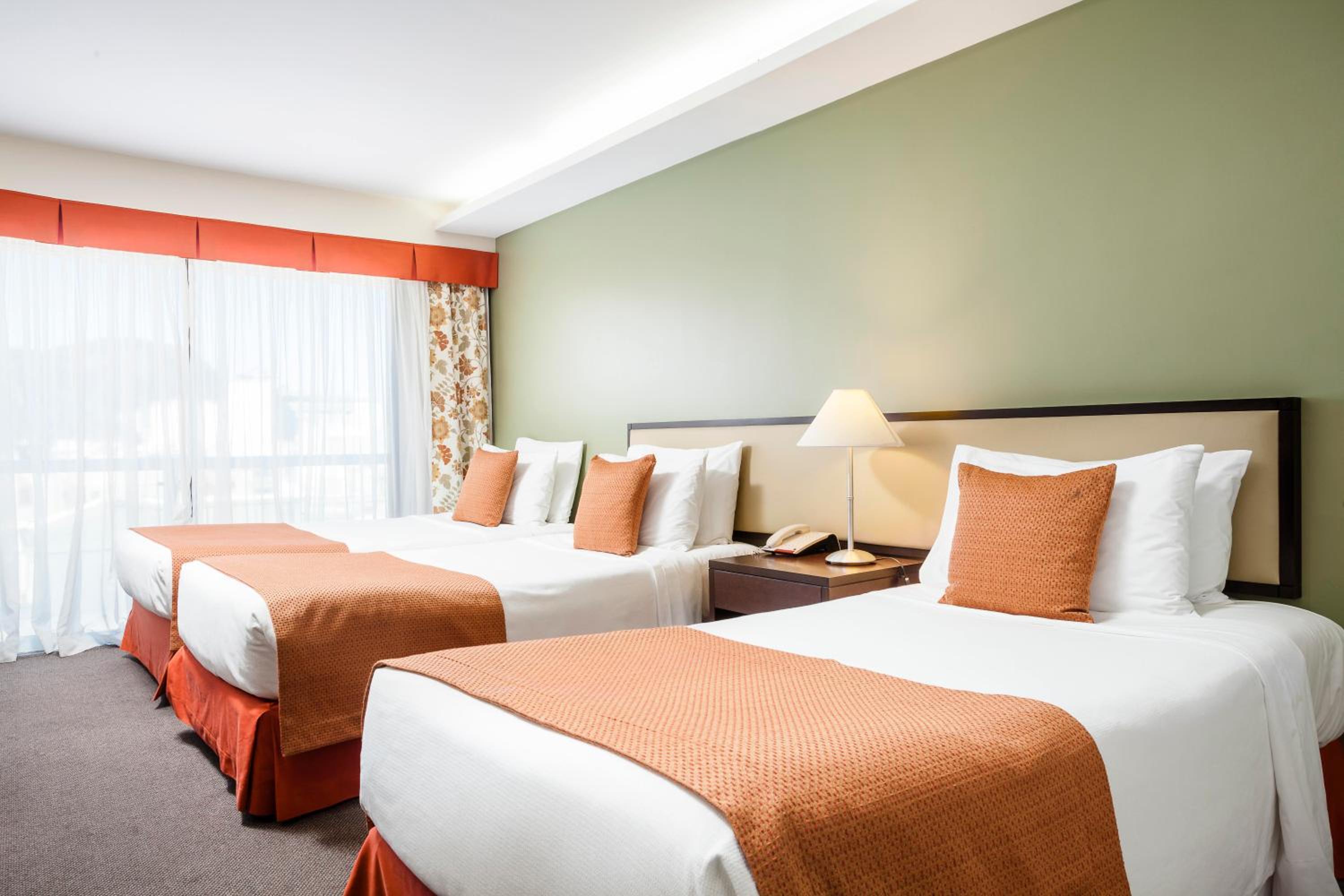 Classic Triple Room with Side Sea View