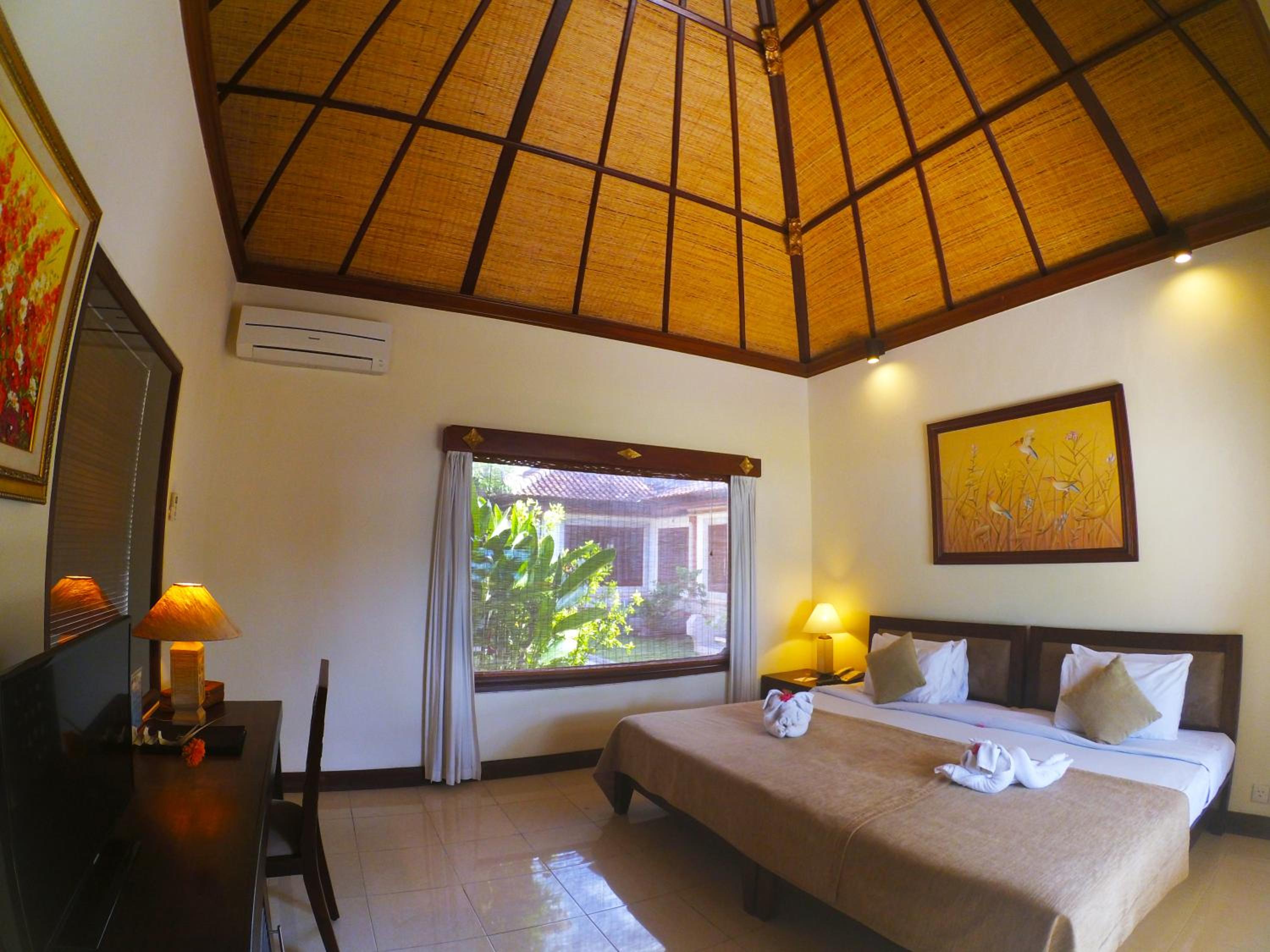 Deluxe Room with Garden View - Photo 1
