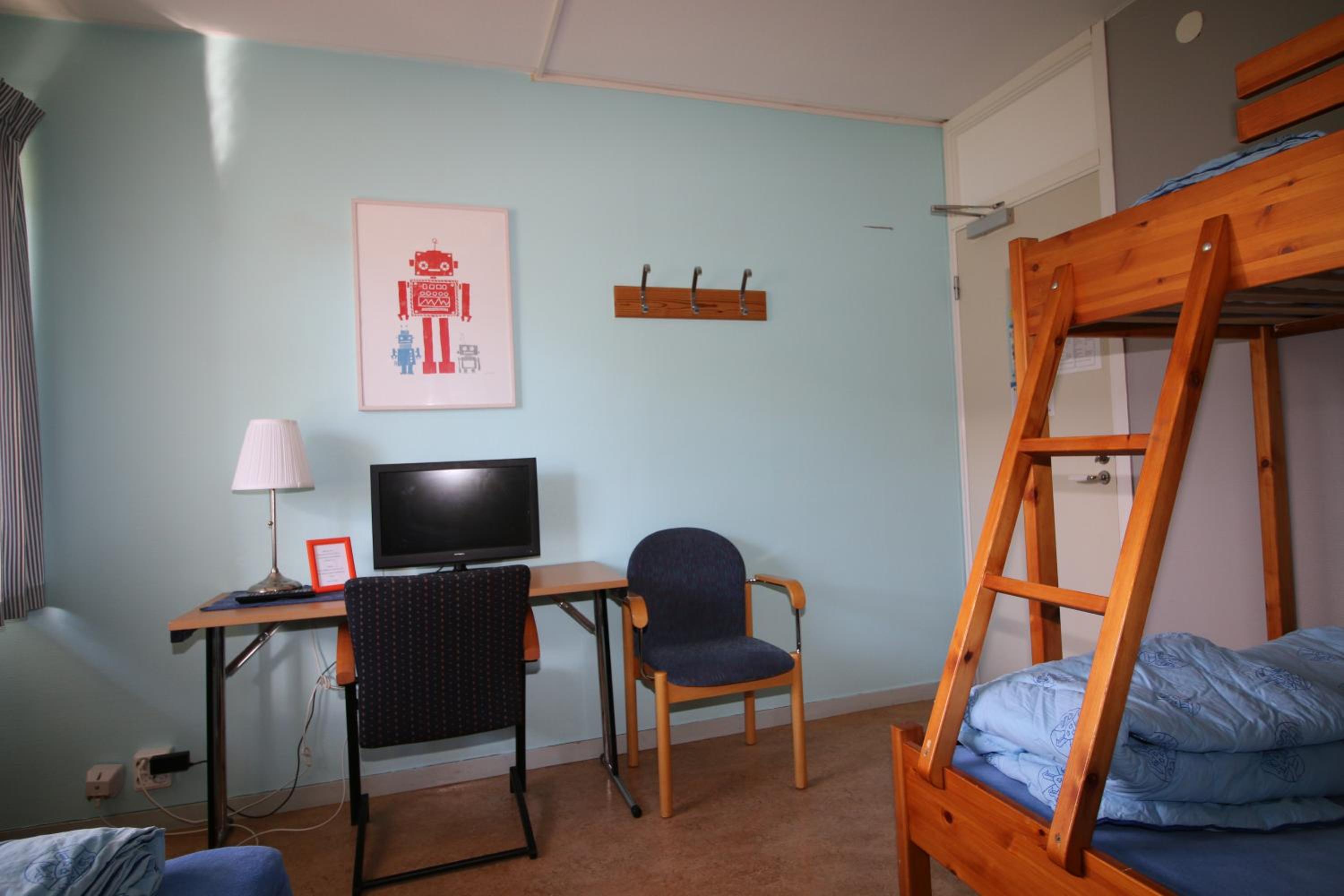 Family Room (2 Adults + 2 Children) with Shared Bathroom photo 1