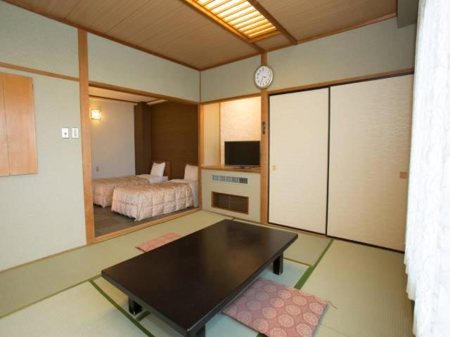 Twin Room With Tatami Area - Non-Smoking photo 1