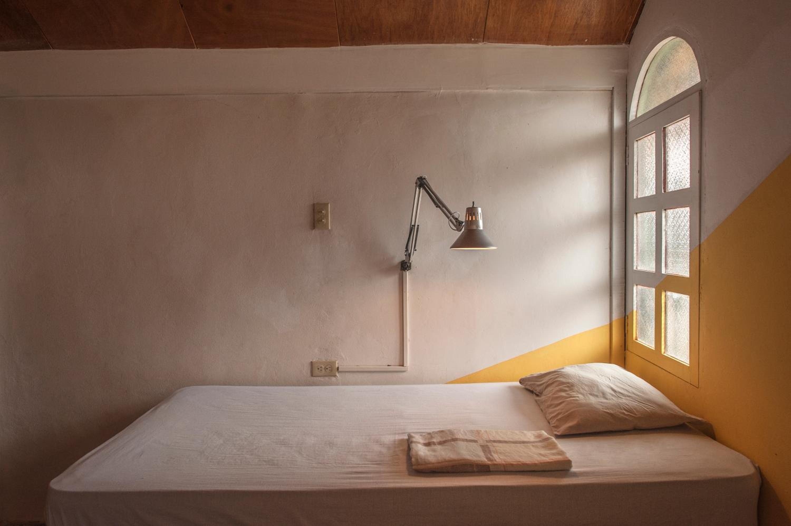 Single Bed in Dormitory Room
