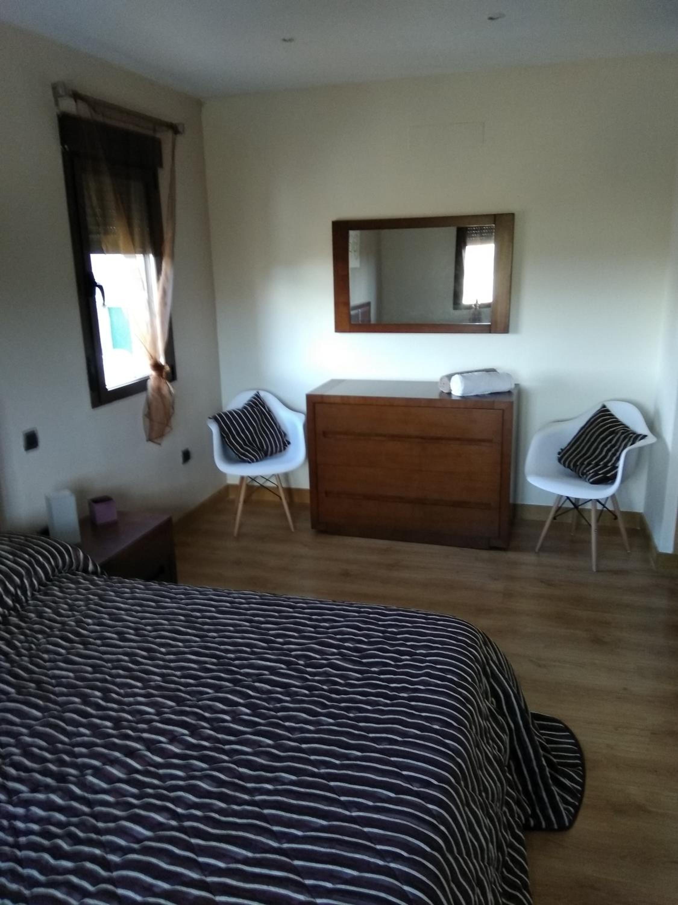 Casa de cuatro habitaciones
