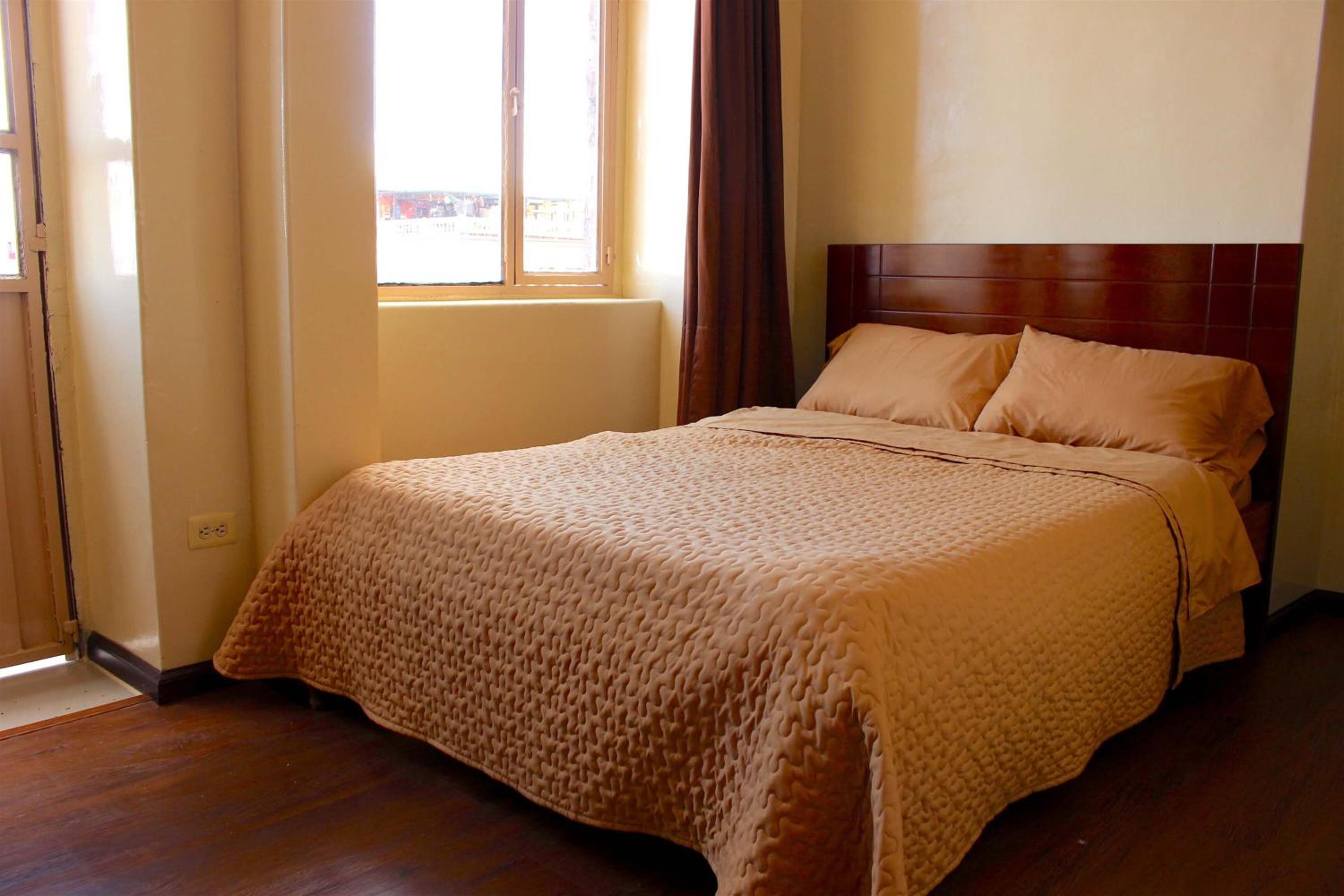 Standard Double Room with Shared Bathroom