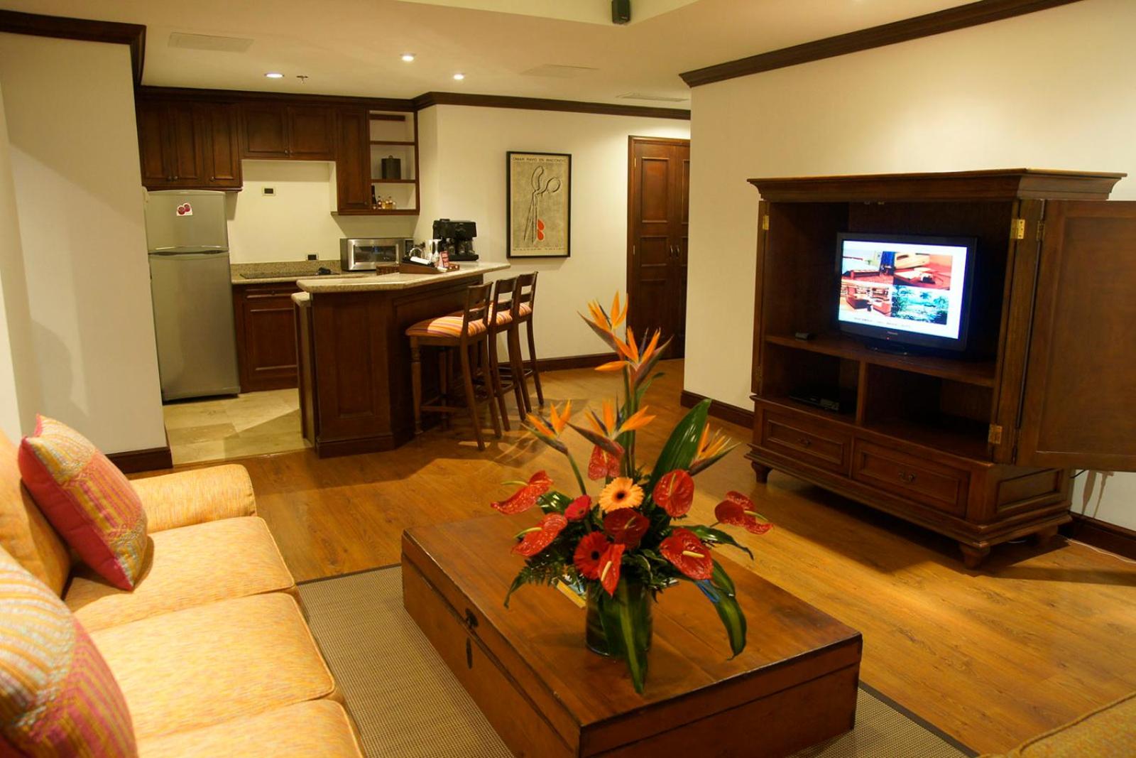 Master Suite with Two Queen Beds and Sofa Bed