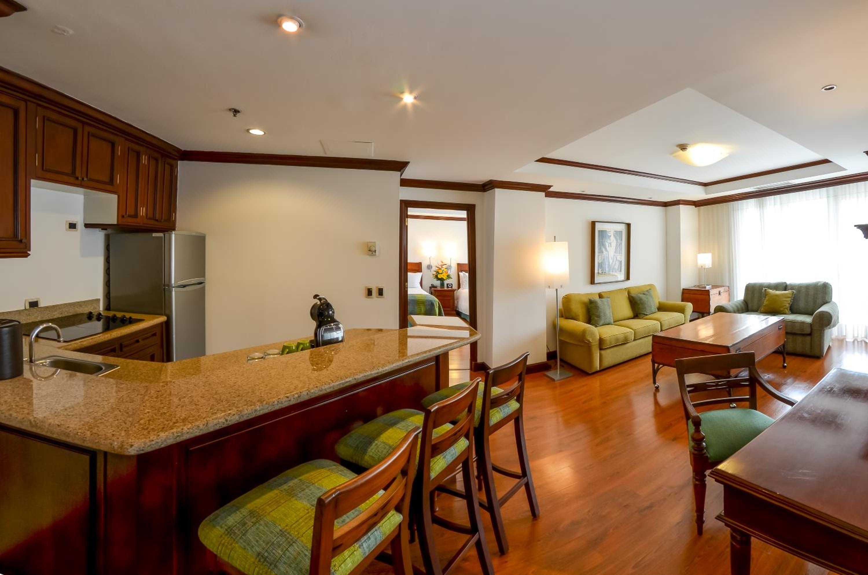 Master Suite with Two Queen Beds and Sofa Bed photo 2