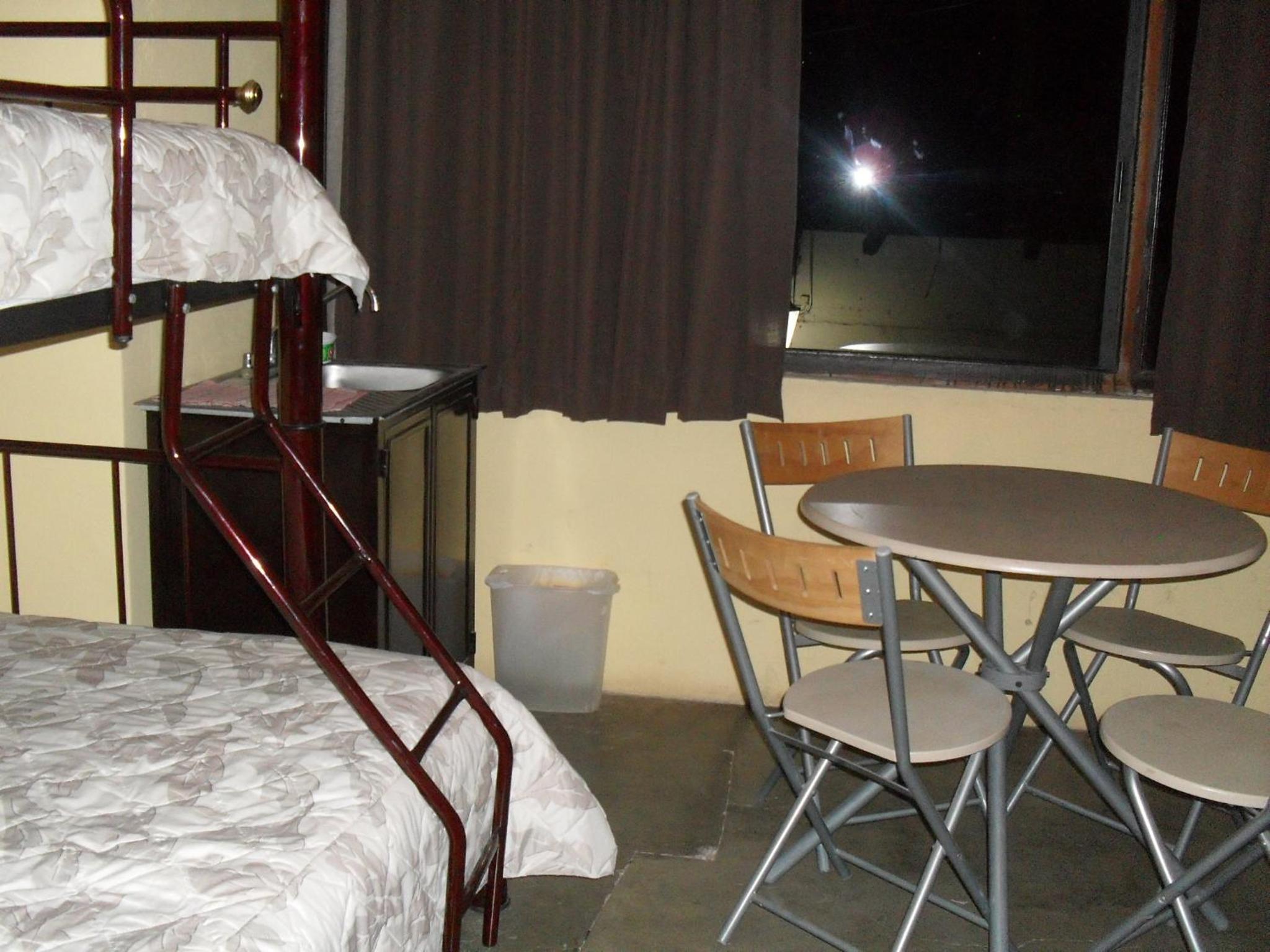 Single Bed In Dormitory Room photo 1