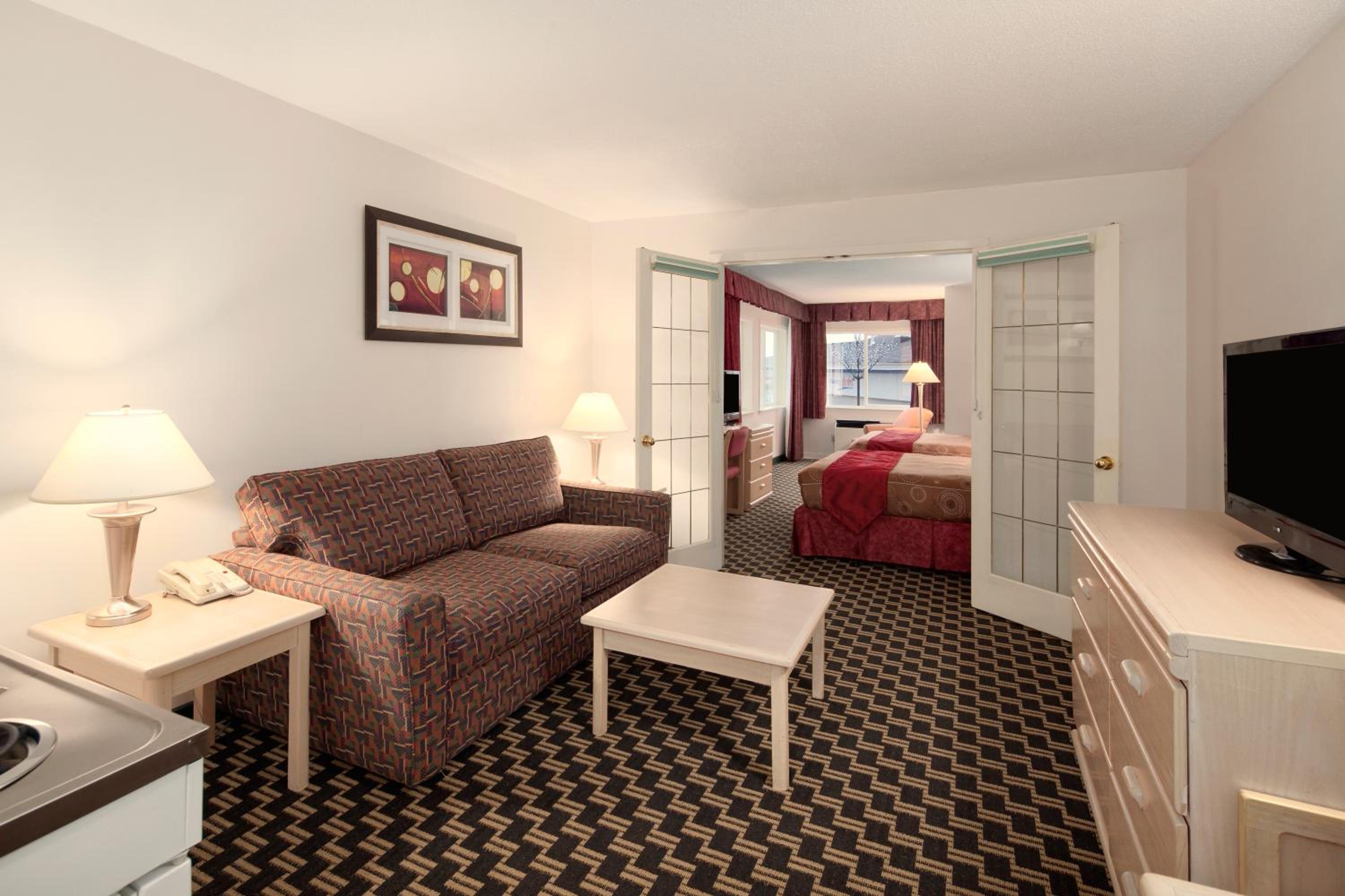 Junior Suite with with Two Queen Beds and Full Kitchen - Photo 1