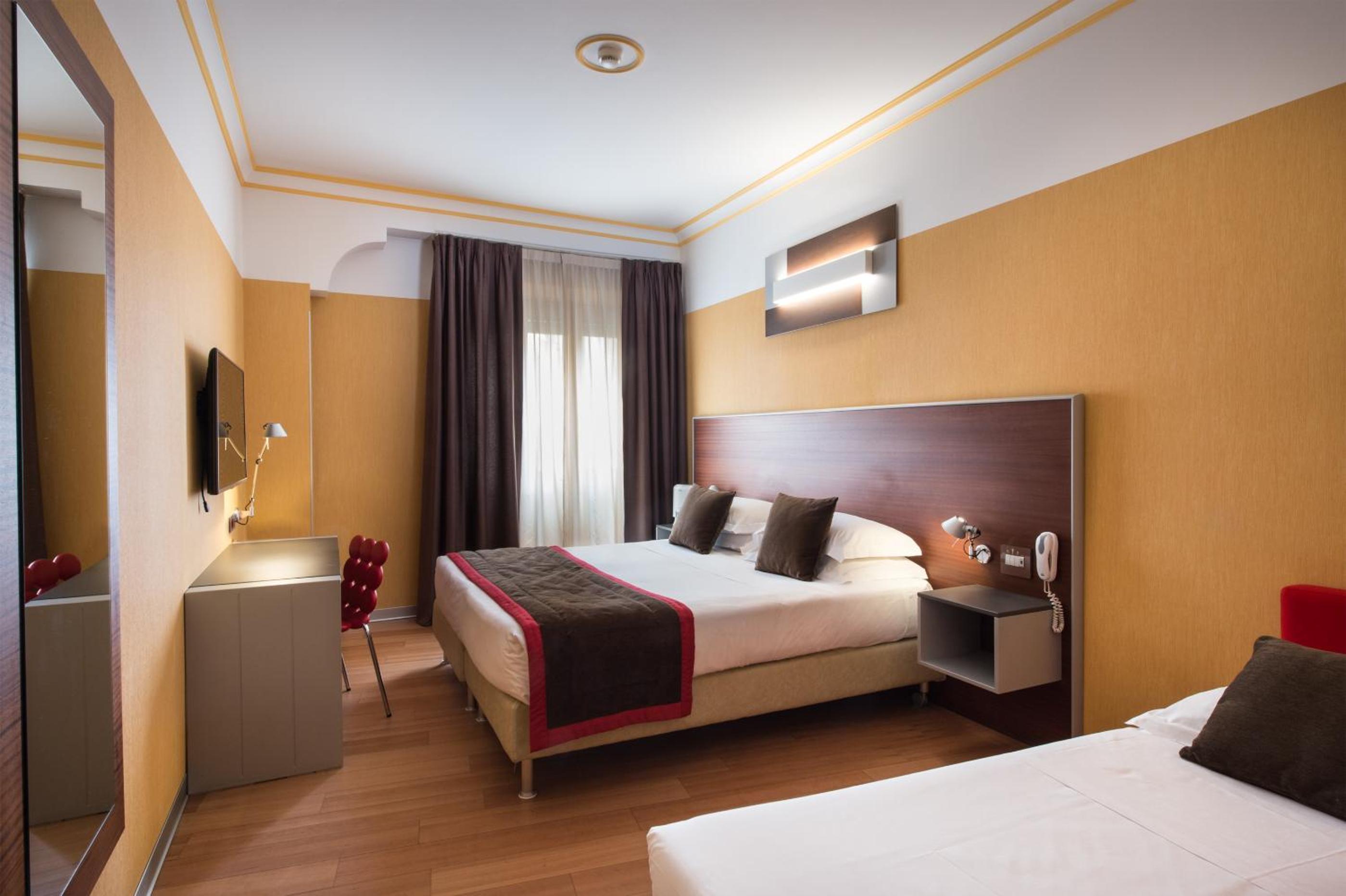 Deluxe King Room with Sofa Bed - Photo 11