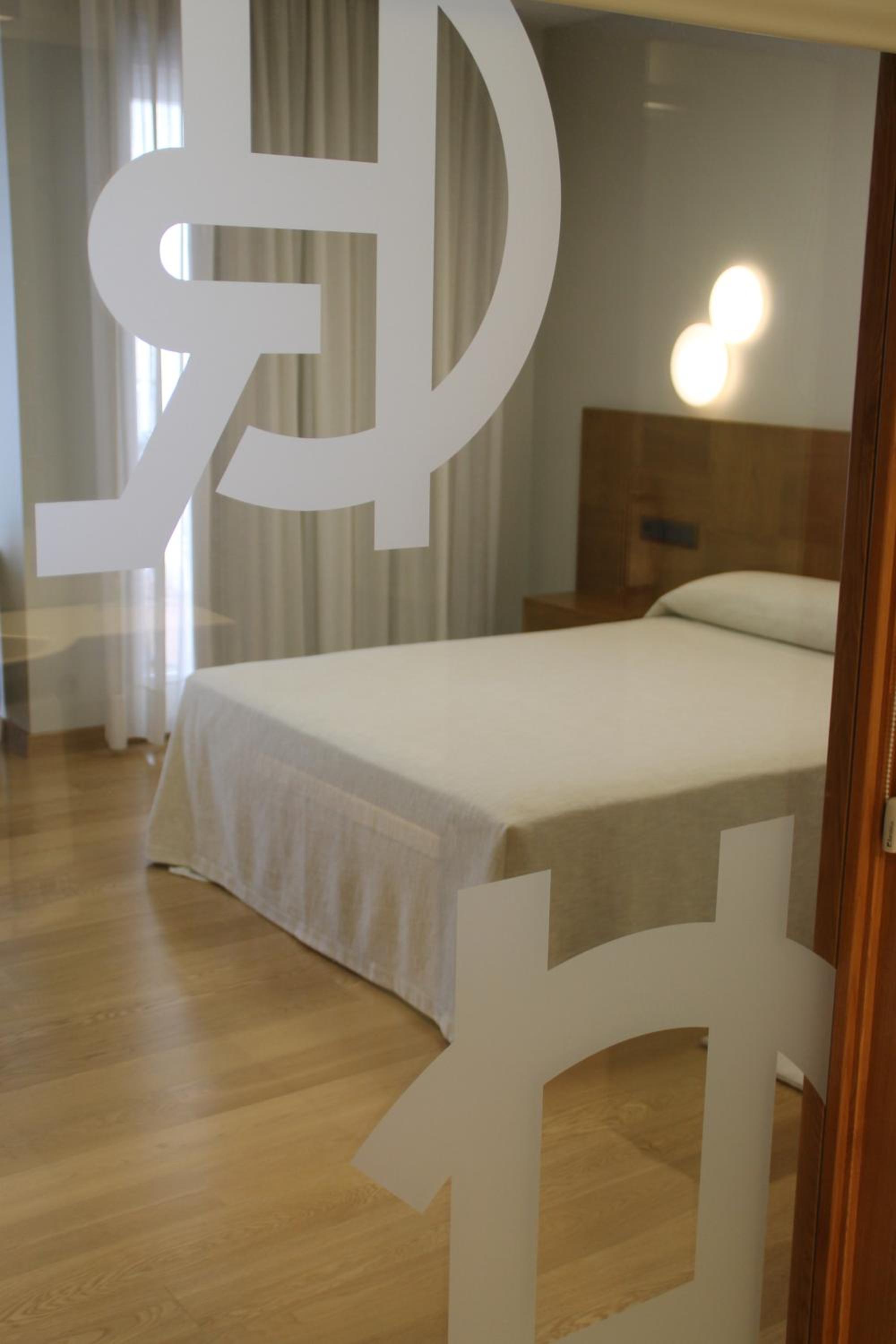 Habitación Doble Estándar o con Dos Camas Individuales.