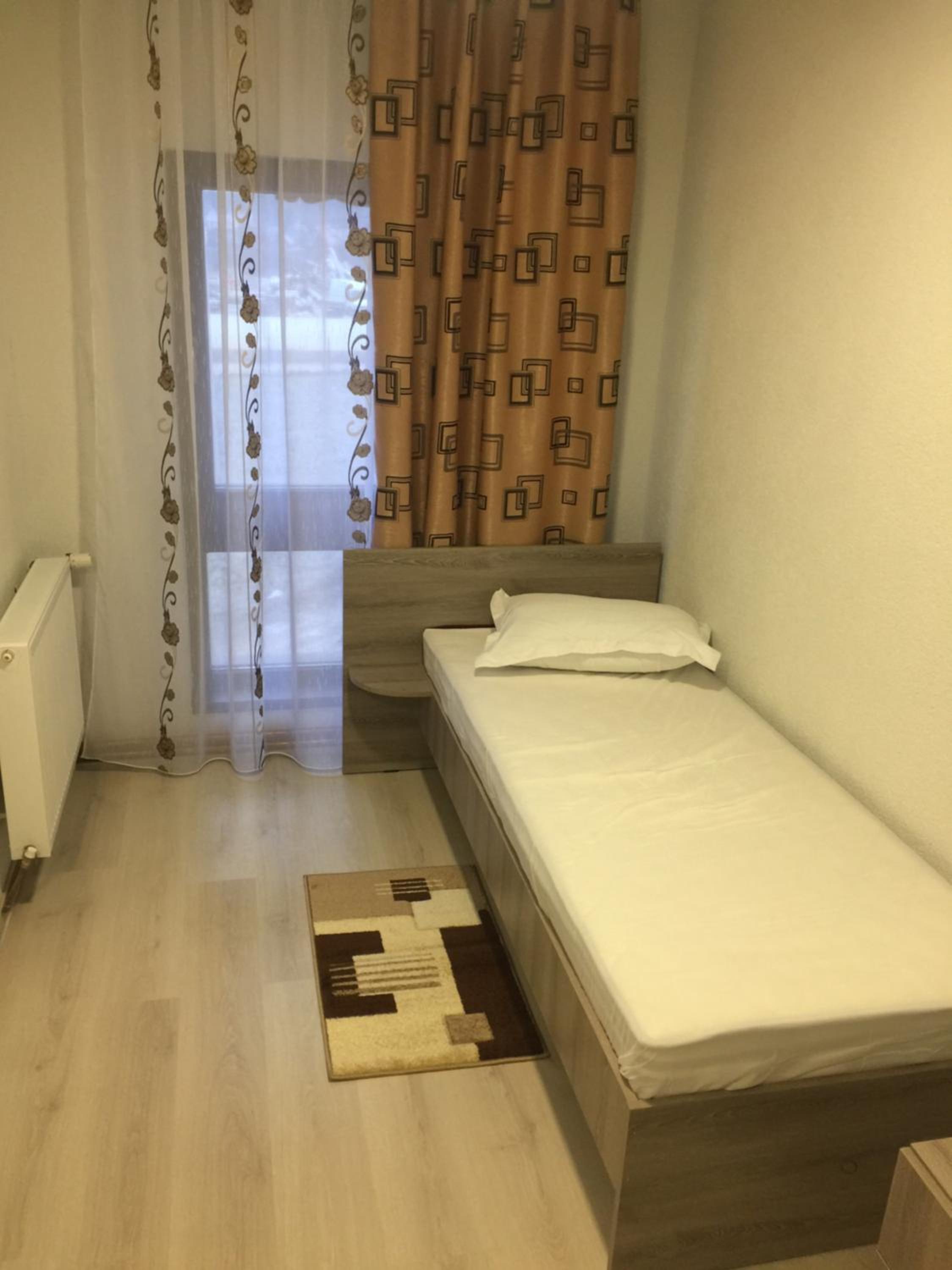 Deluxe Family Suite - Photo 17