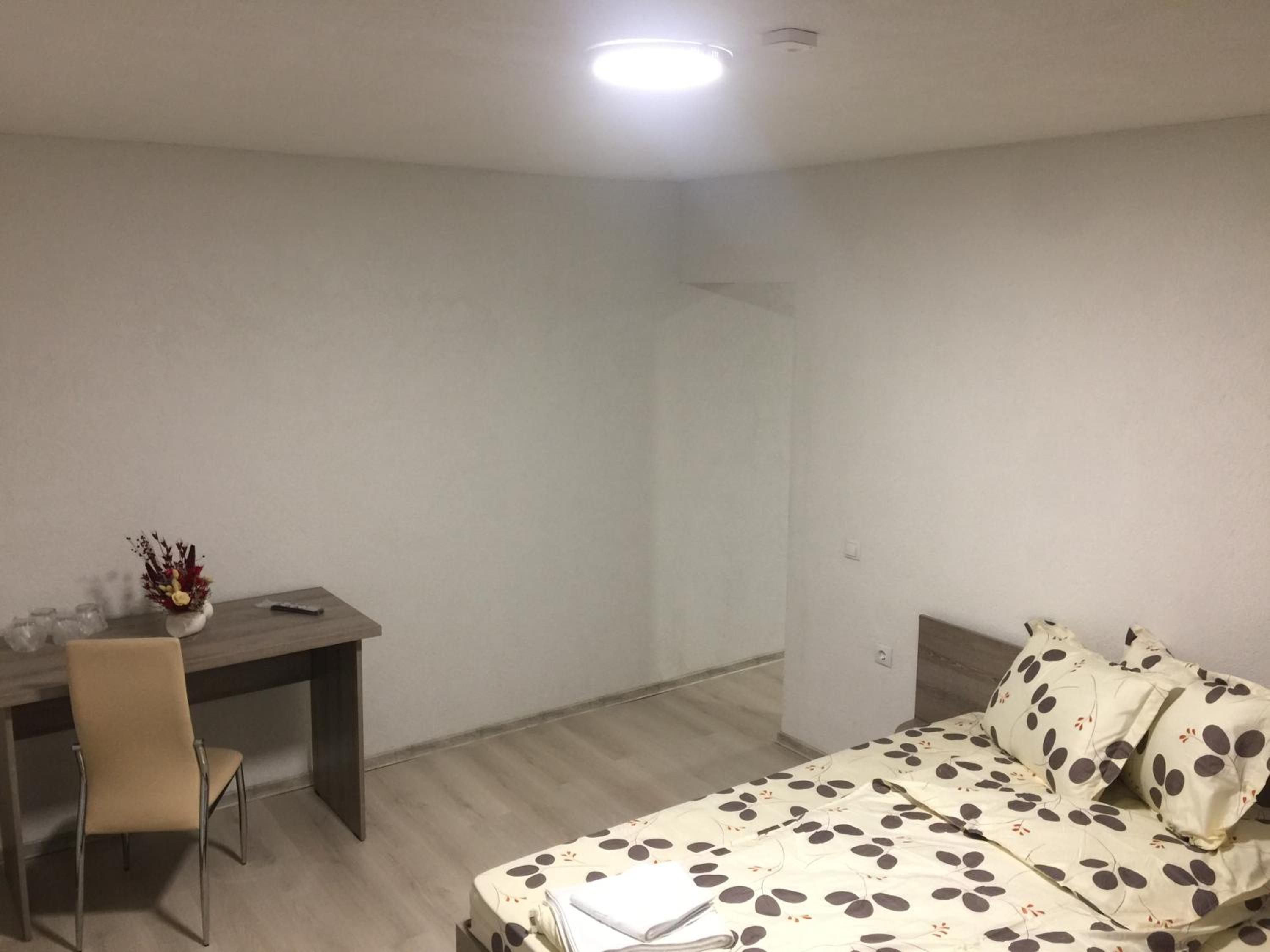 Deluxe Family Suite - Photo 16