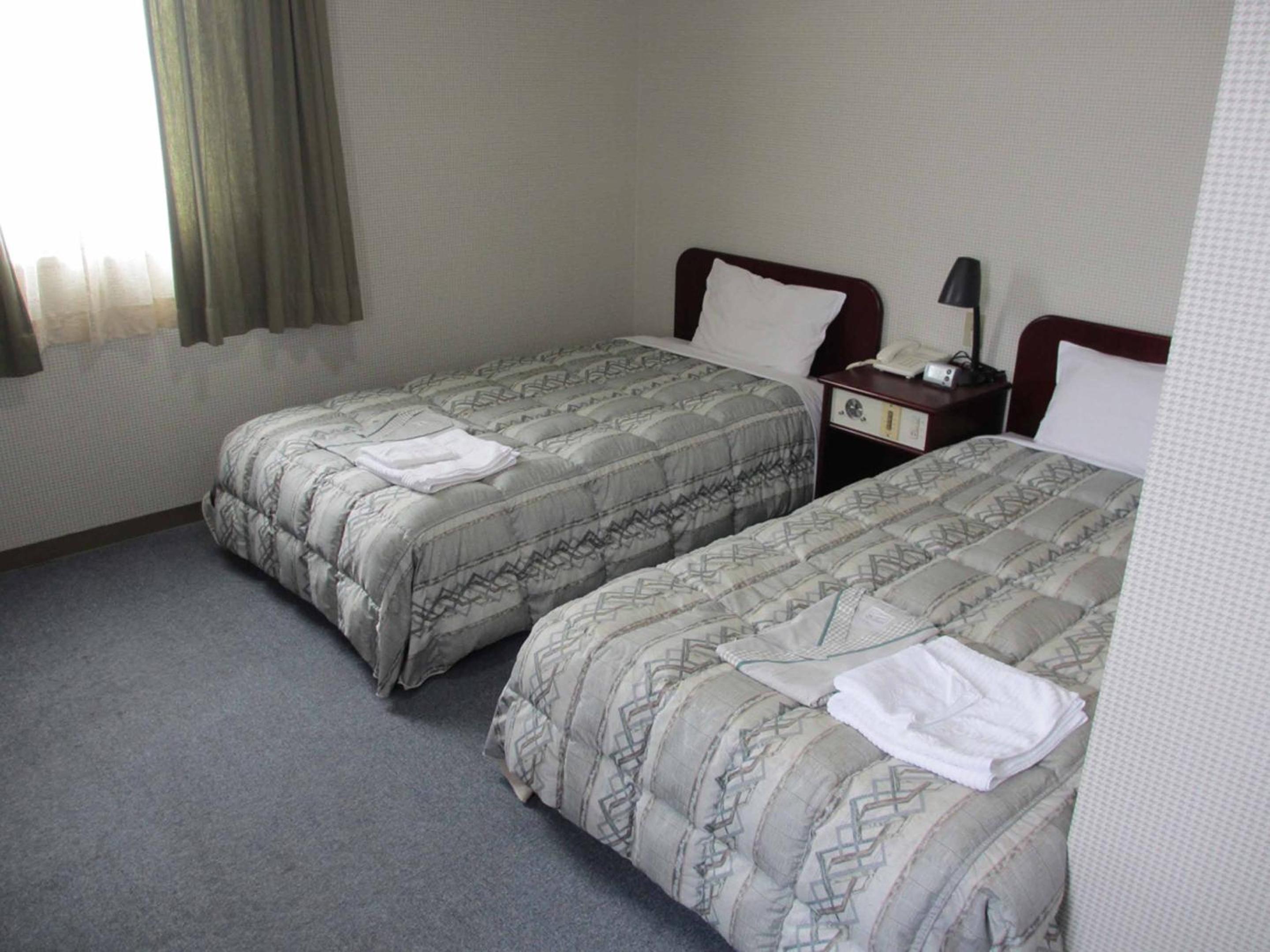 Twin Room - Non-Smoking - Photo 4