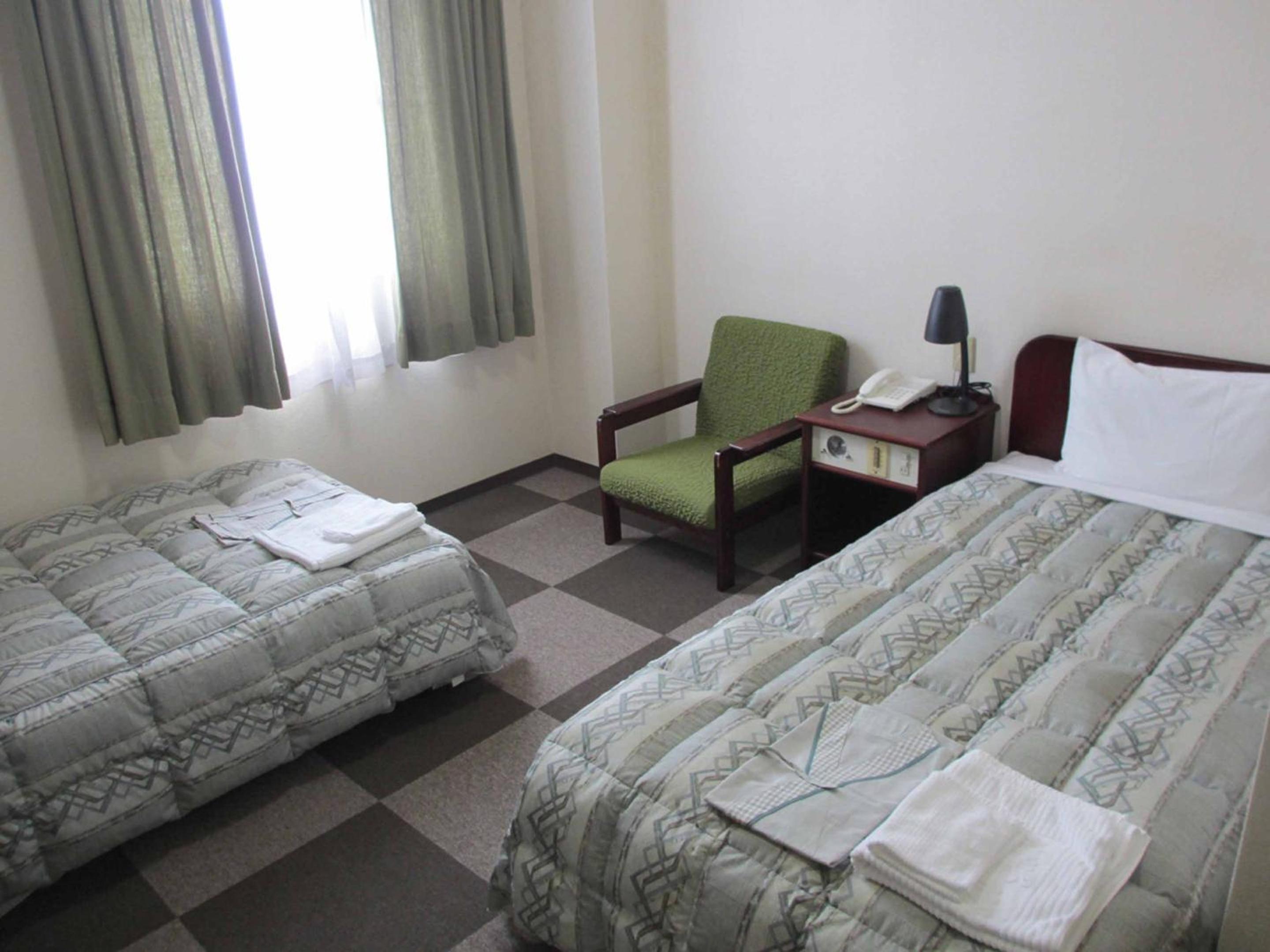 Twin Room - Non-Smoking - Photo 3