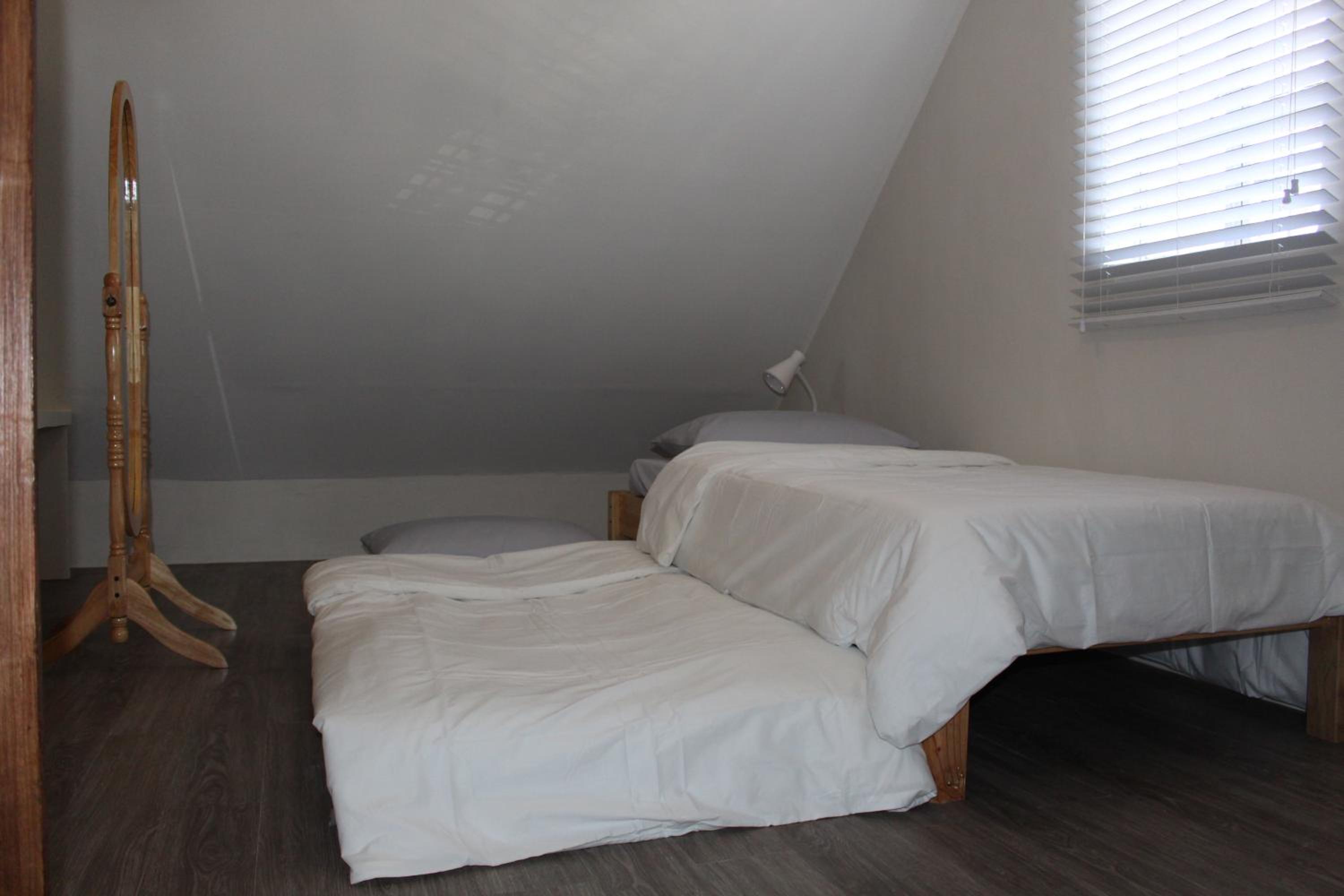 Three-Bedroom Apartment - Photo 25