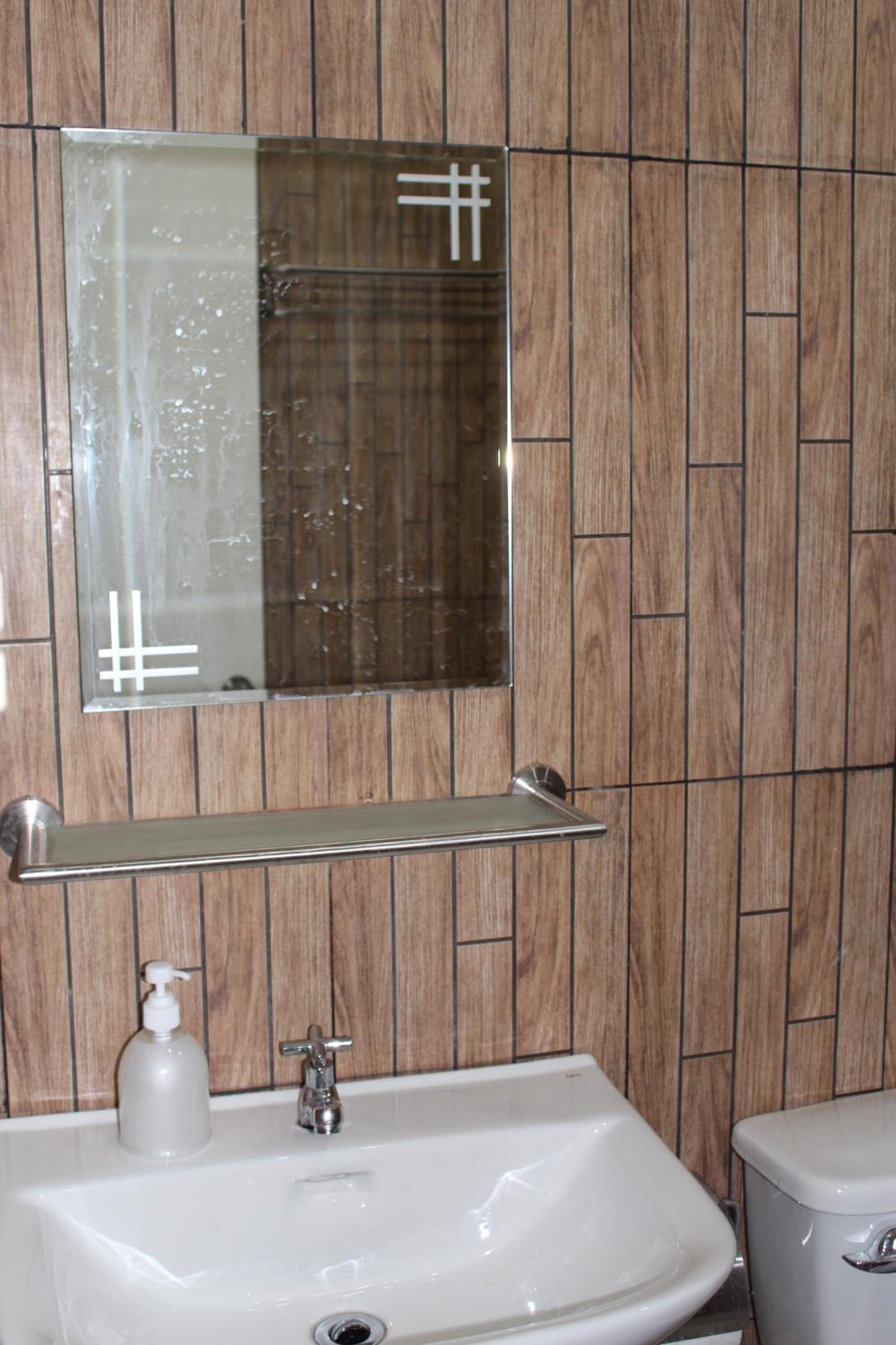 Three-Bedroom Apartment - Photo 24