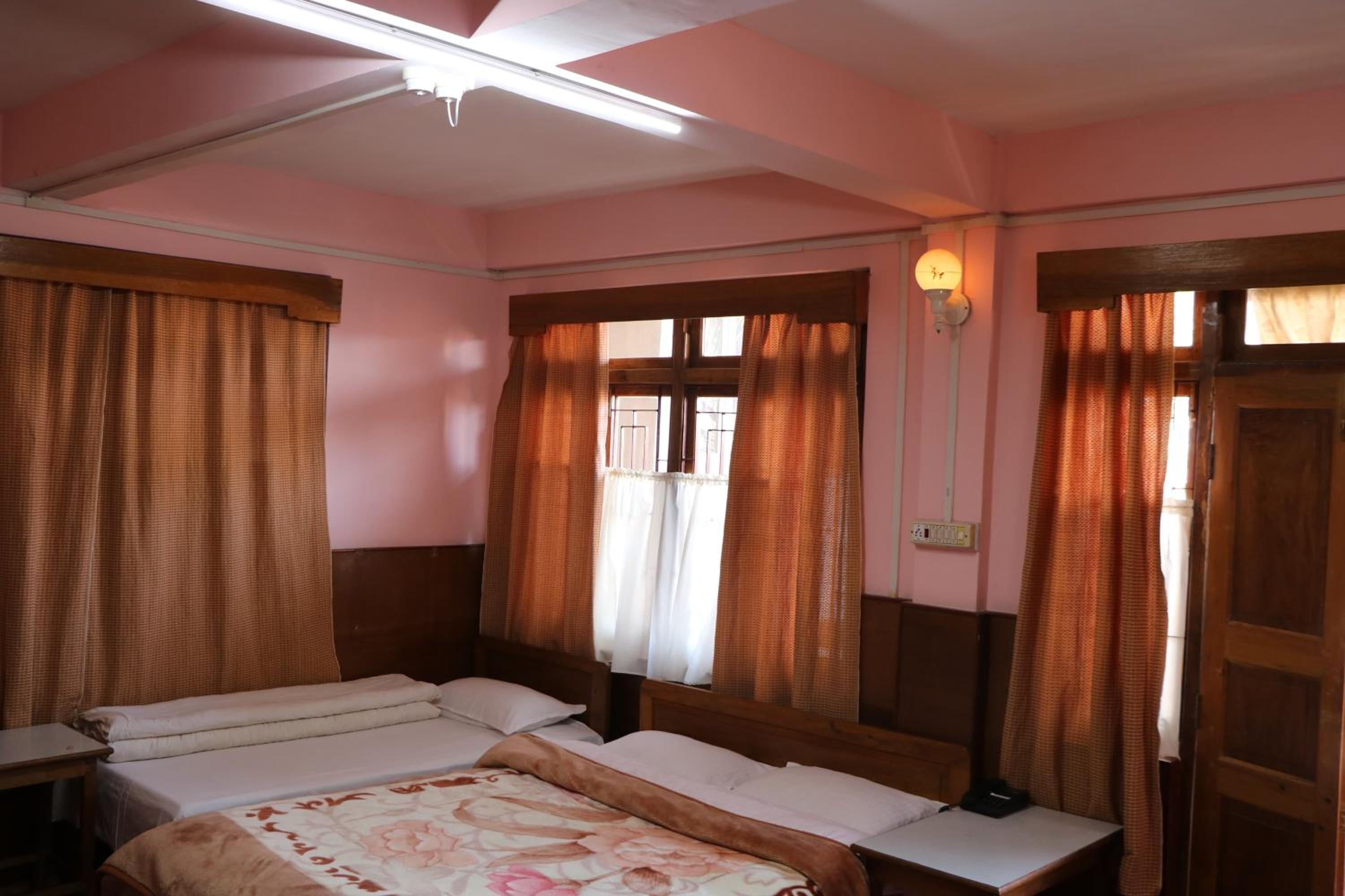 Super Deluxe Triple Room - Photo 2