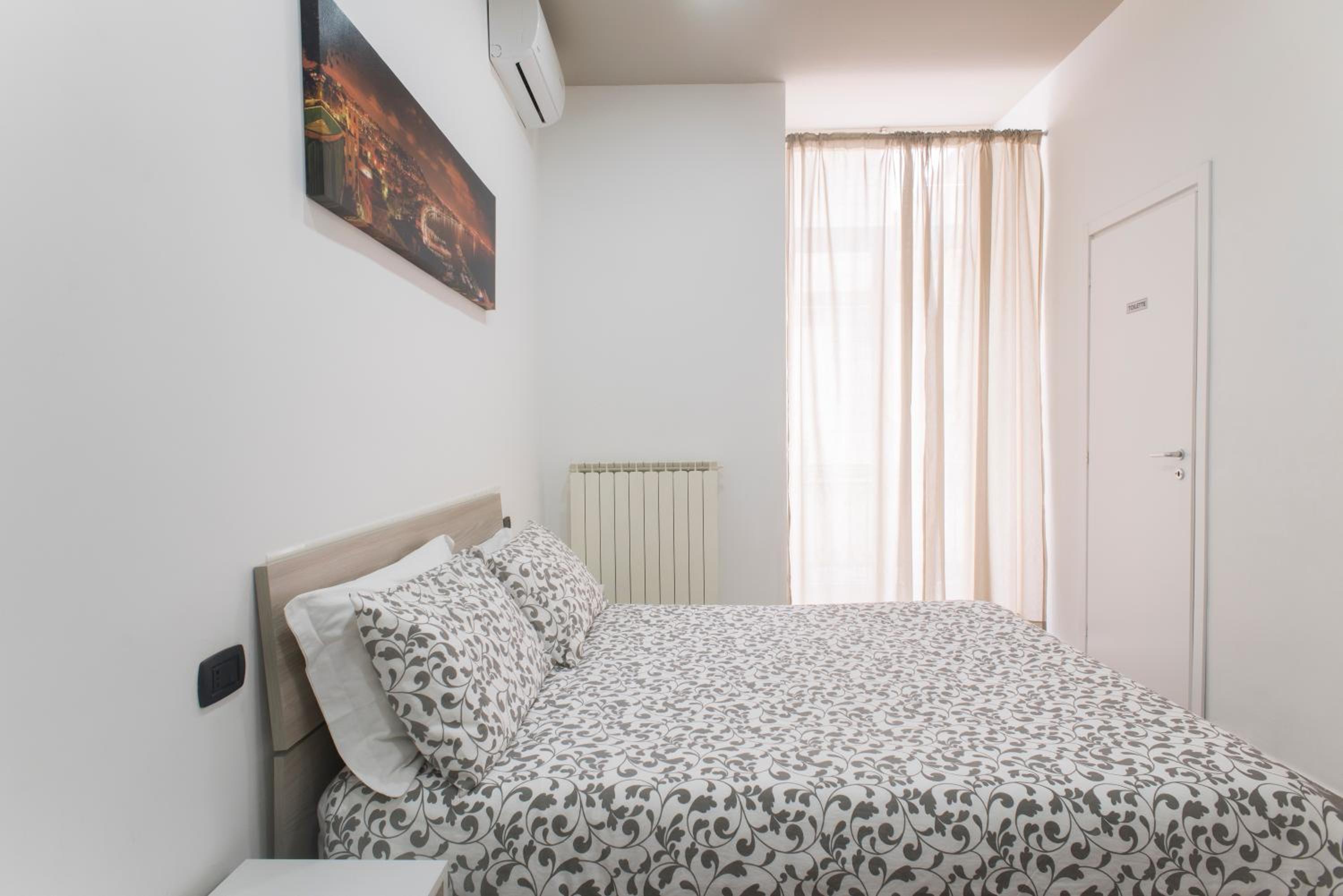 Quadruple Room with Private Bathroom