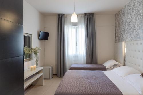 Double or Twin Room - Photo 1