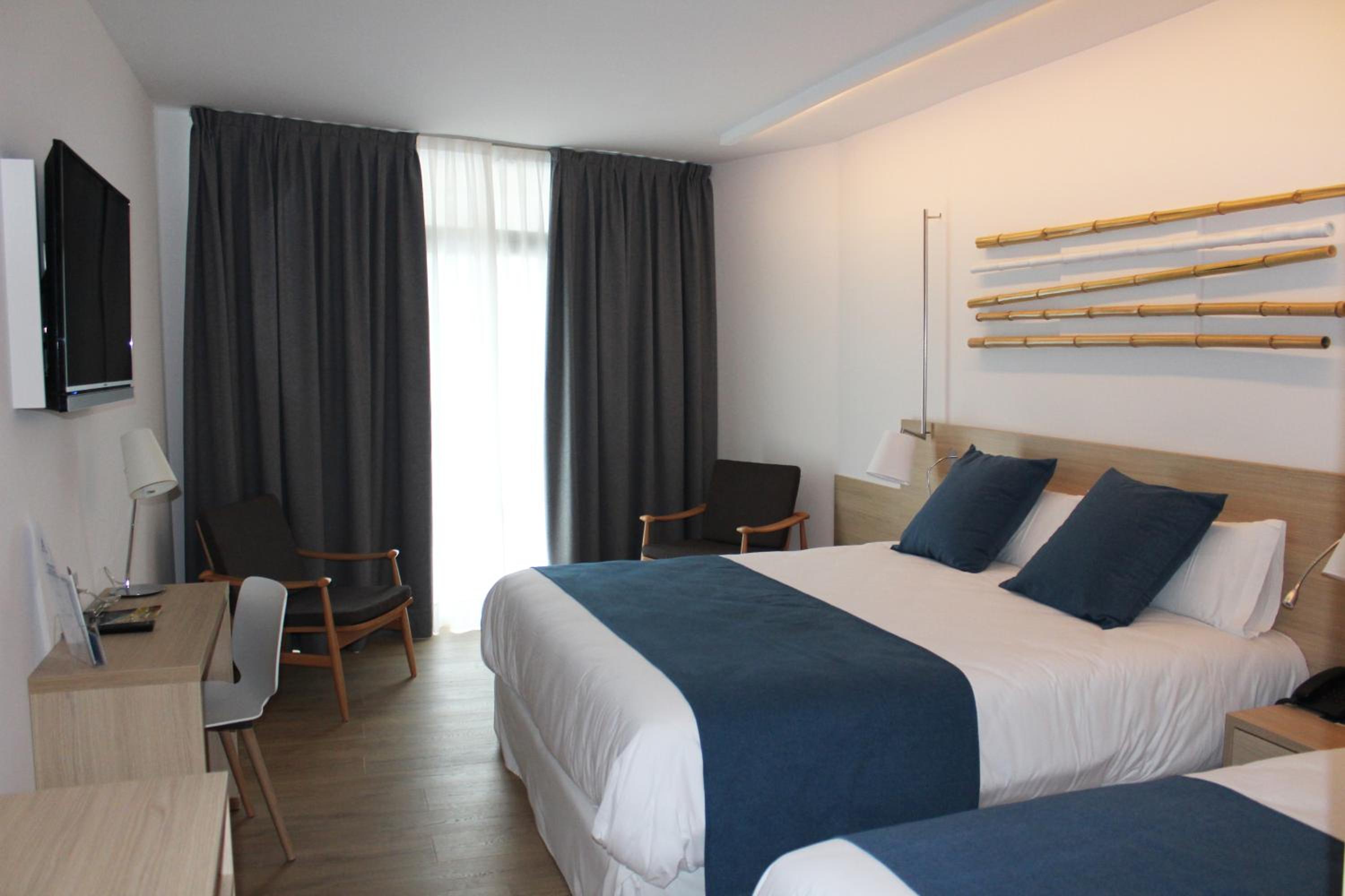 Design Triple Room (2 Adults + 1 Child) - Photo 1