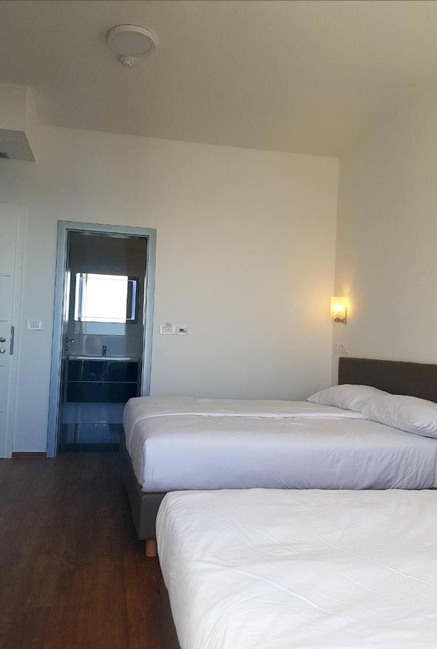 Quadruple Room with Balcony - Photo 1