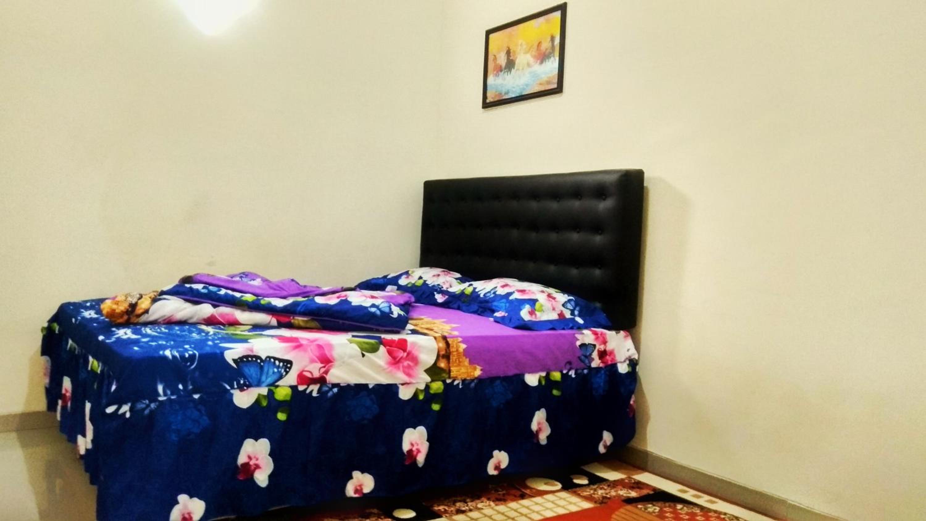 Deluxe Room (2 Adults + 1 Child) - Photo 1