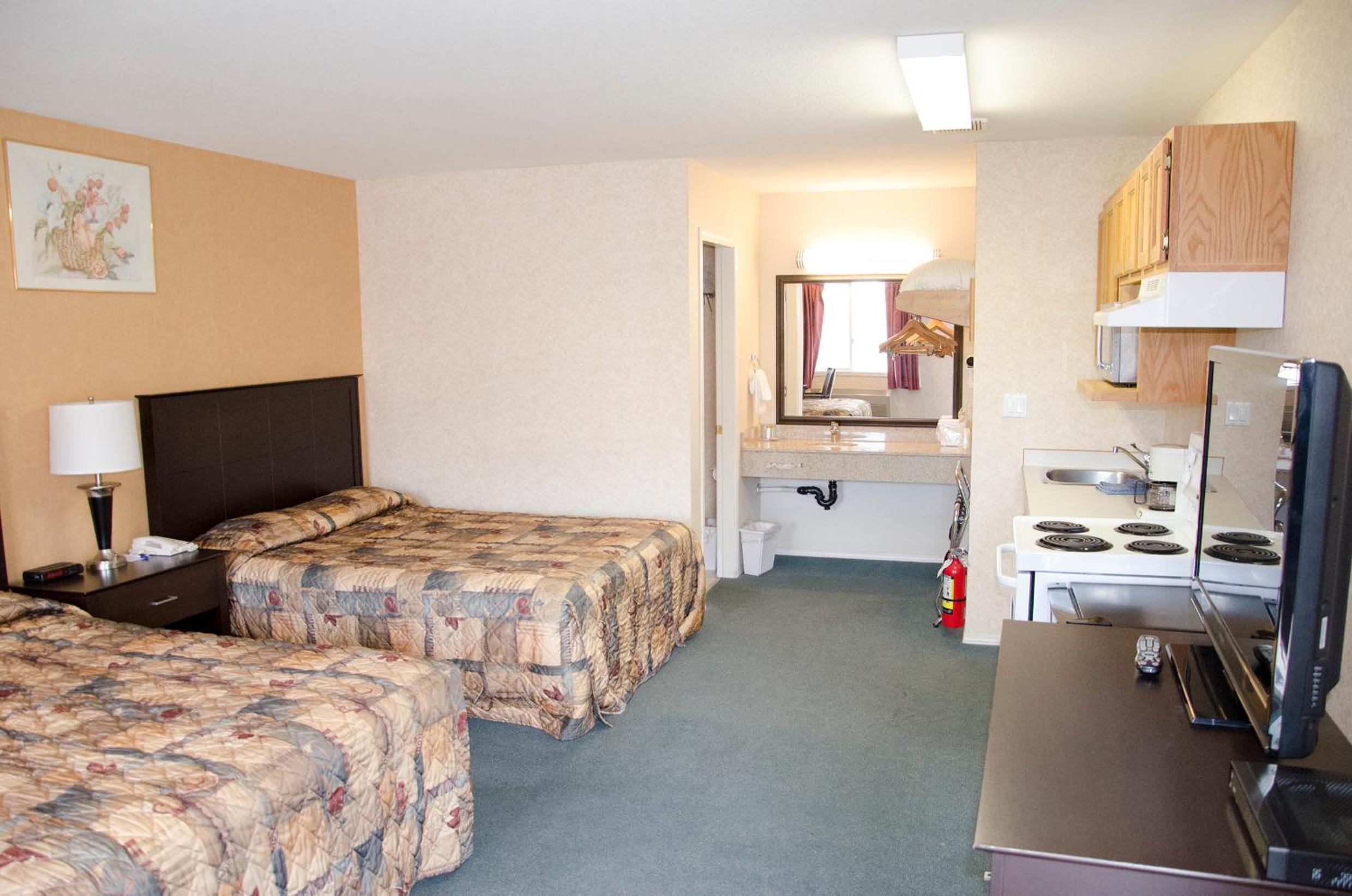 Queen Room with Two Queen Beds and Kitchen - Non-Smoking photo 2