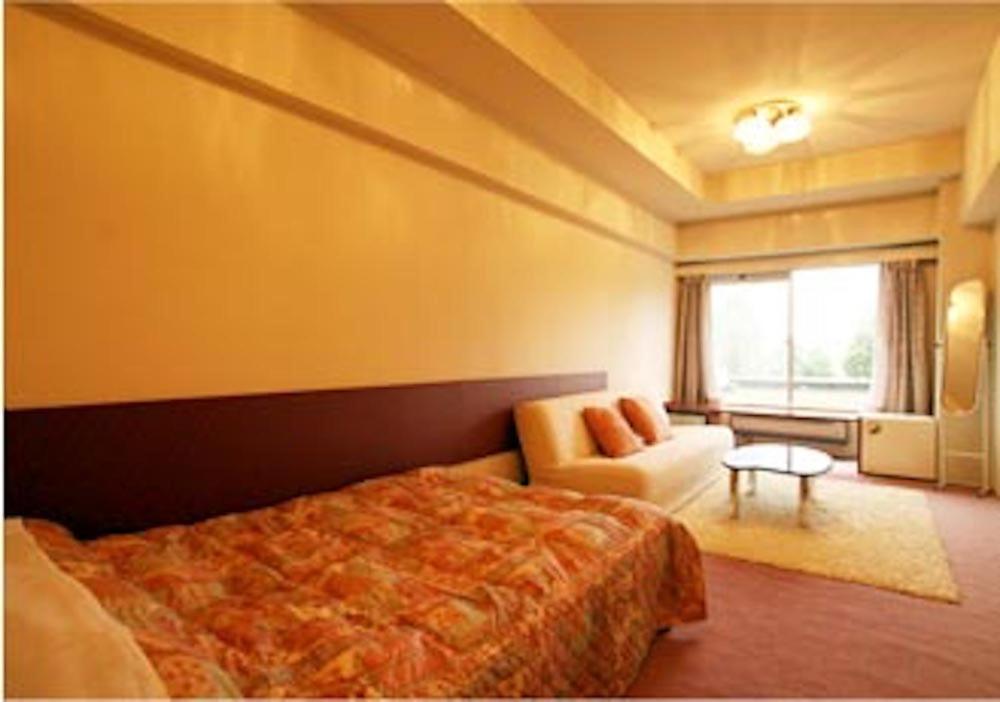 Standard Twin Room - Photo 1