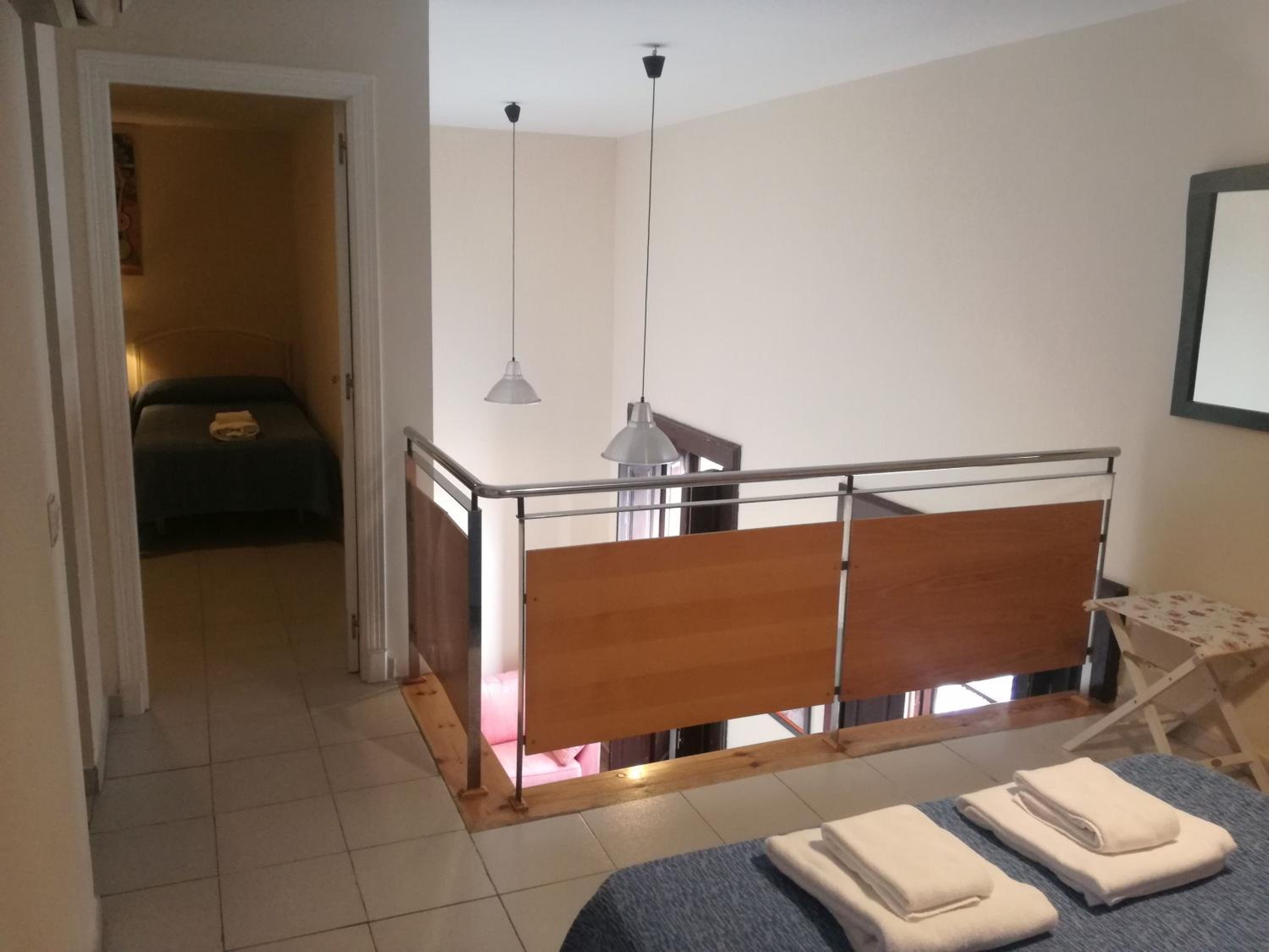 Three-Bedroom Apartment with Balcony - Photo 15