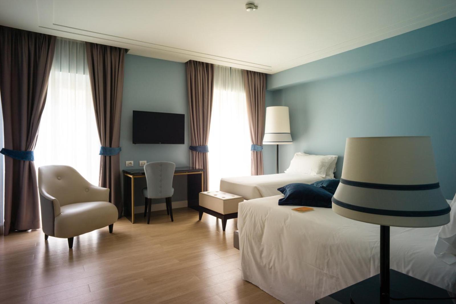 Camera Matrimoniale/Doppia con Letti Singoli con Letto Supplementare