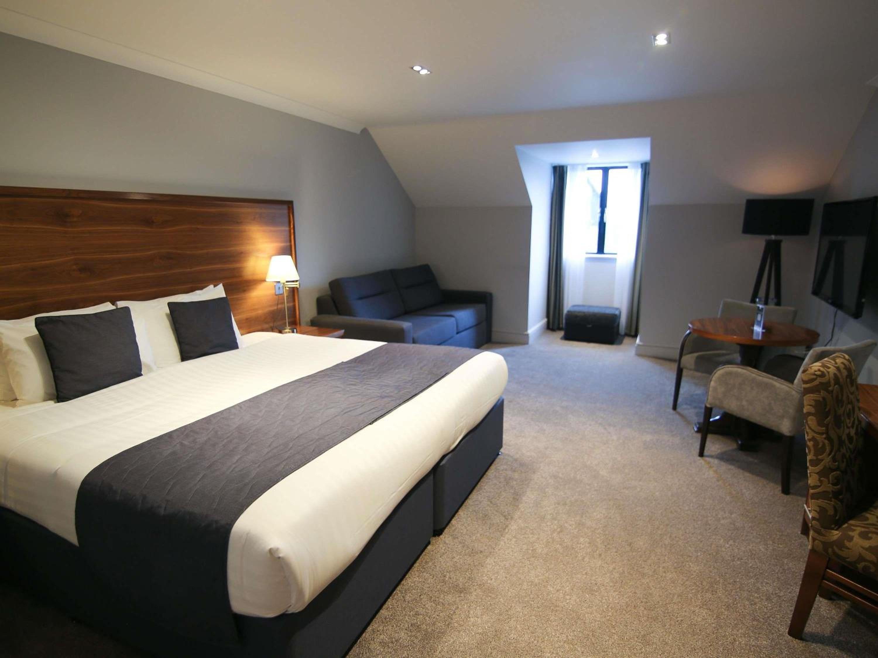 Deluxe Room with One Double or Twin Beds and One Single Sofa Bed