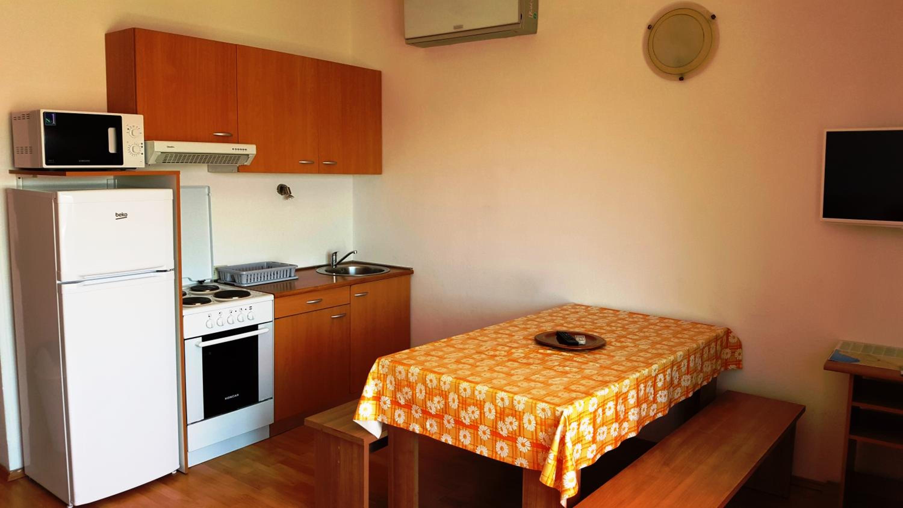 Three-Bedroom Apartment - Photo 2