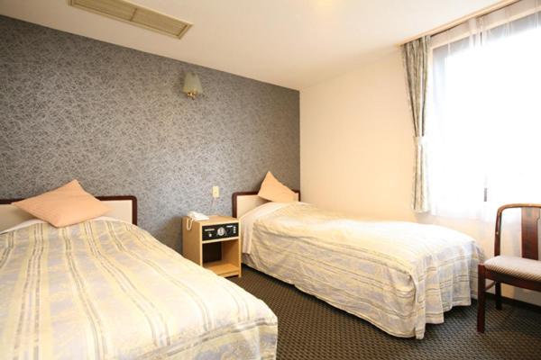 Twin Room - Non-Smoking photo 1