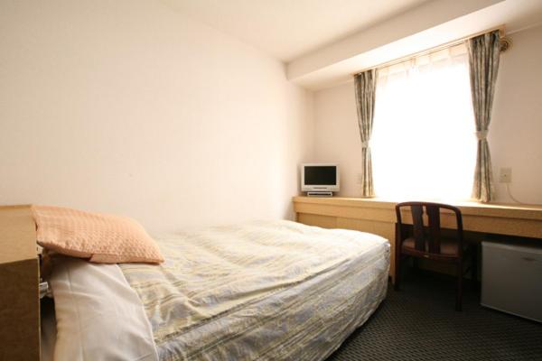 Semi Double Room - Non-Smoking  photo 1