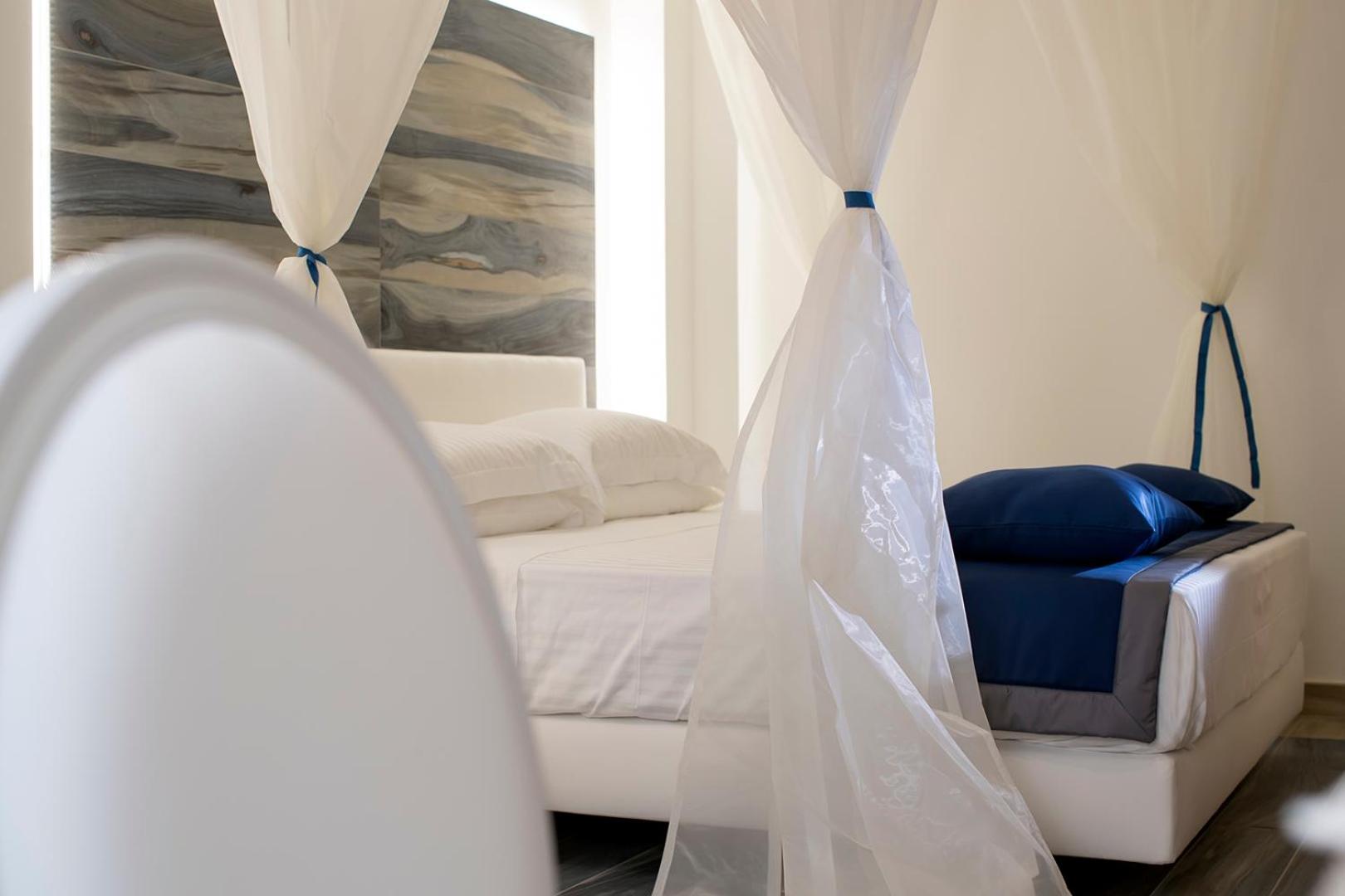 Deluxe Quadruple Room - Photo 5