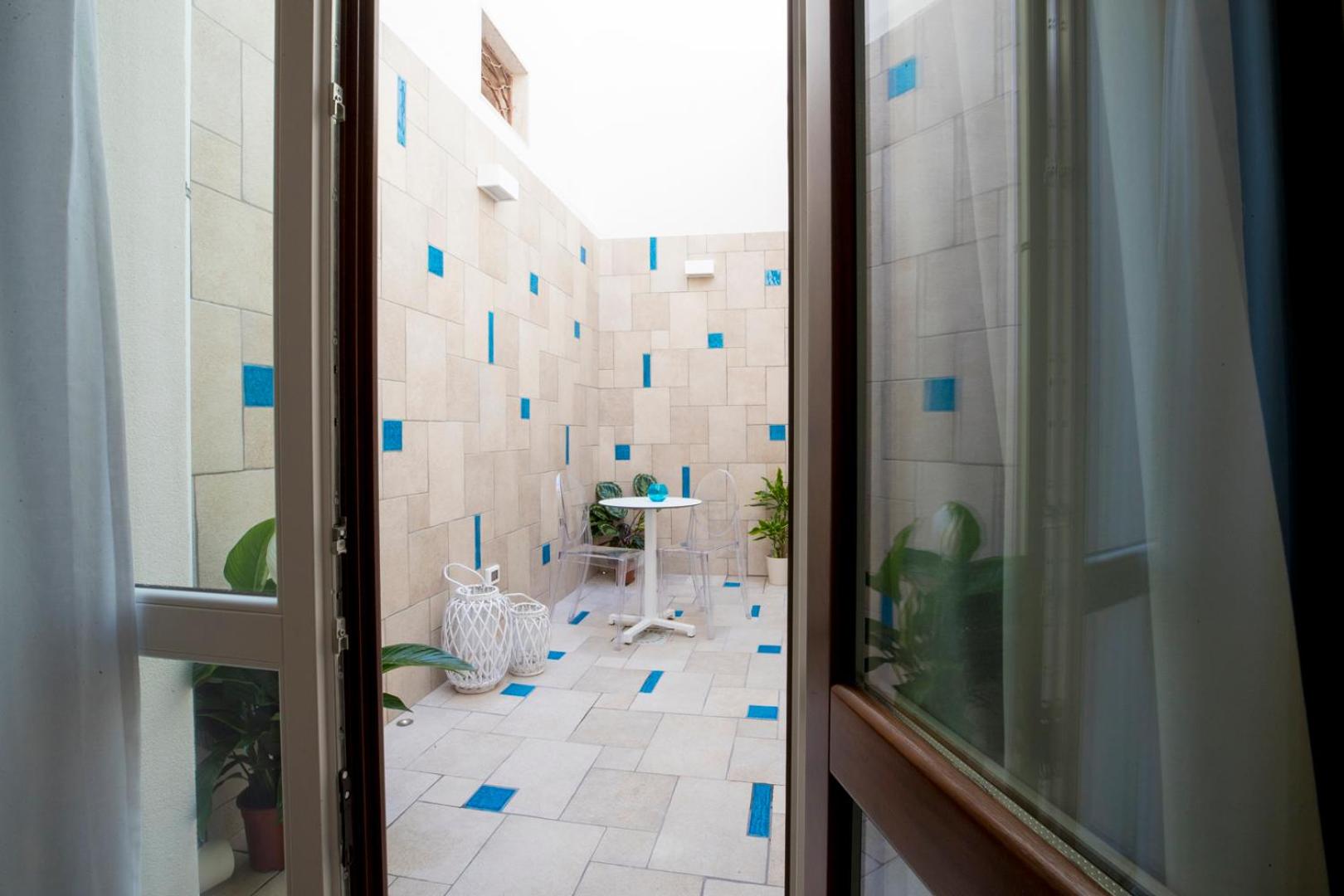 Deluxe Quadruple Room - Photo 7