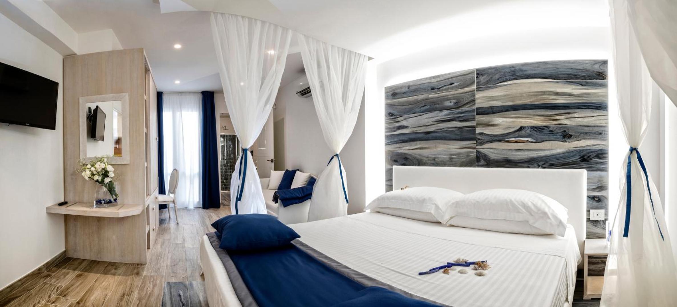 Deluxe Quadruple Room - Photo 2
