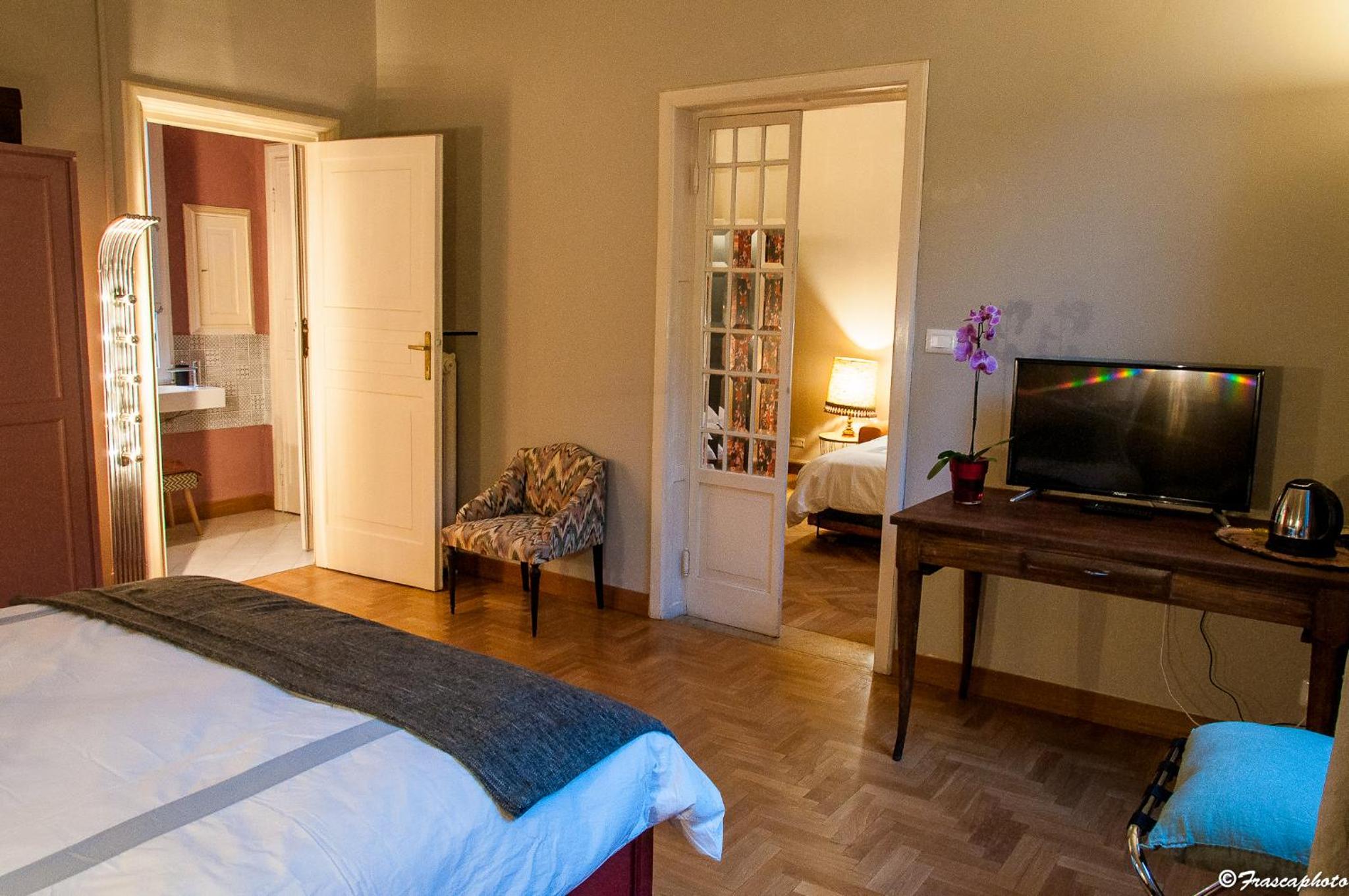 Deluxe Quadruple Room - Photo 16