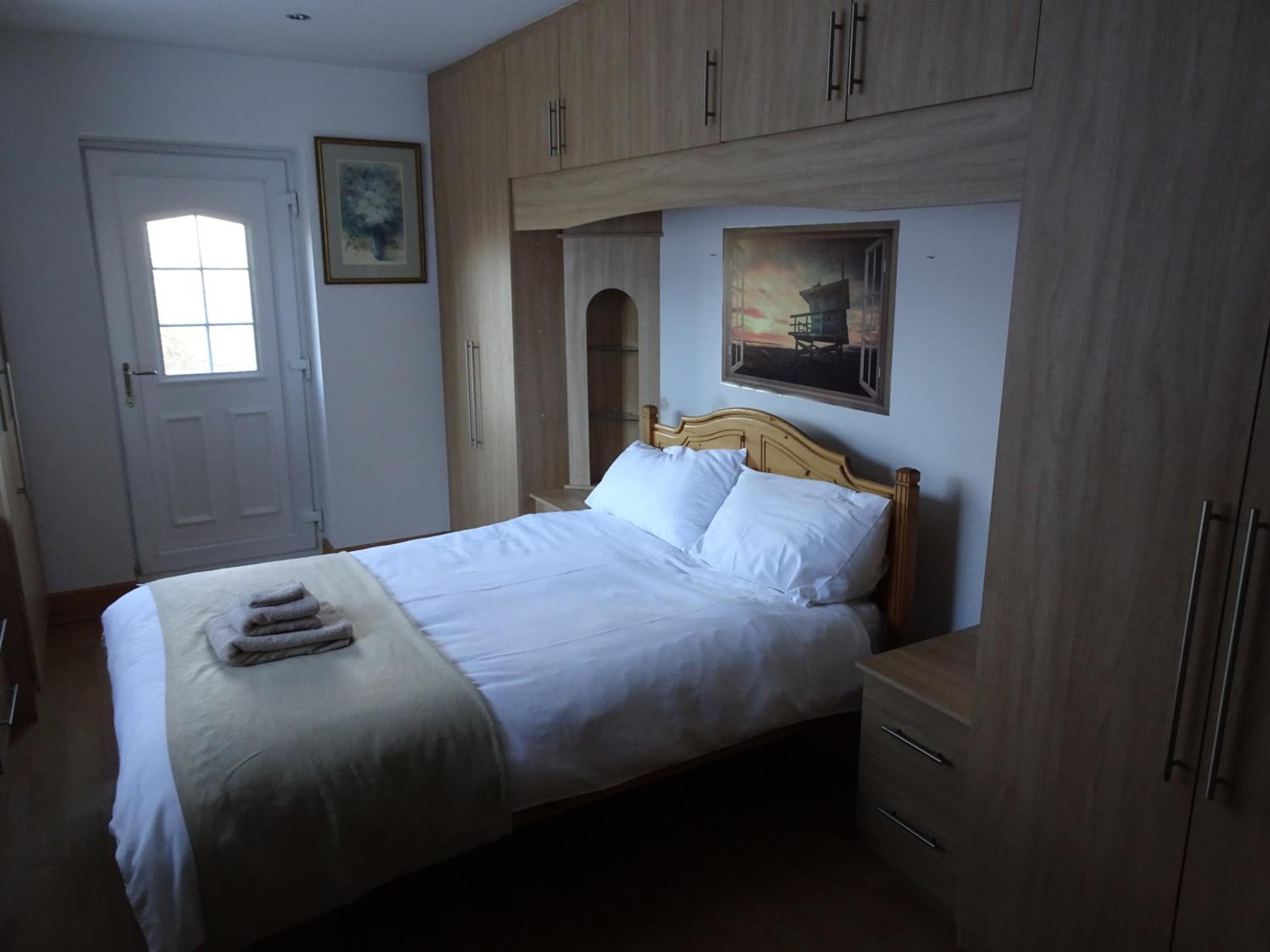 Three-Bedroom House - Photo 11