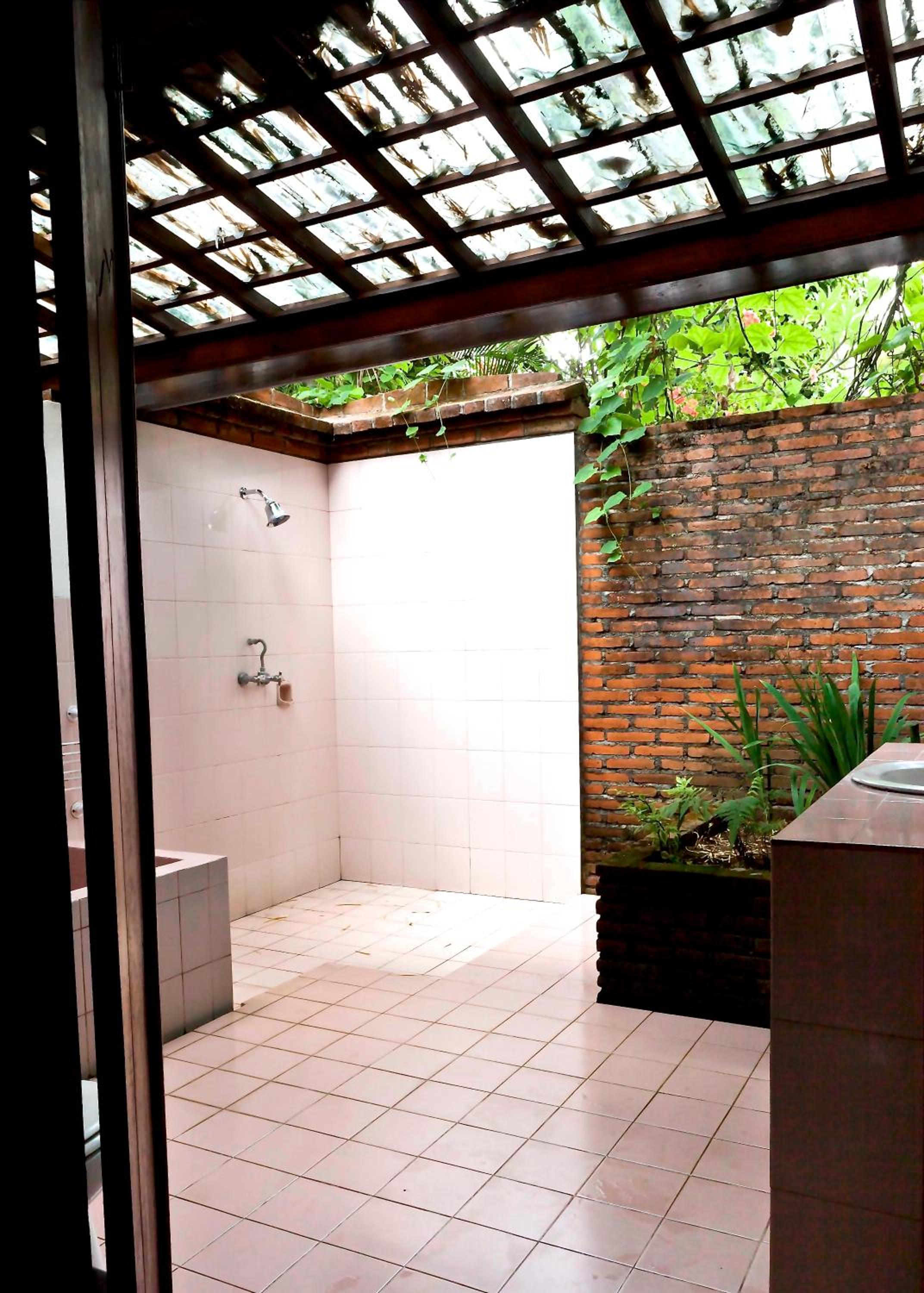 Four-Bedroom House - Photo 31