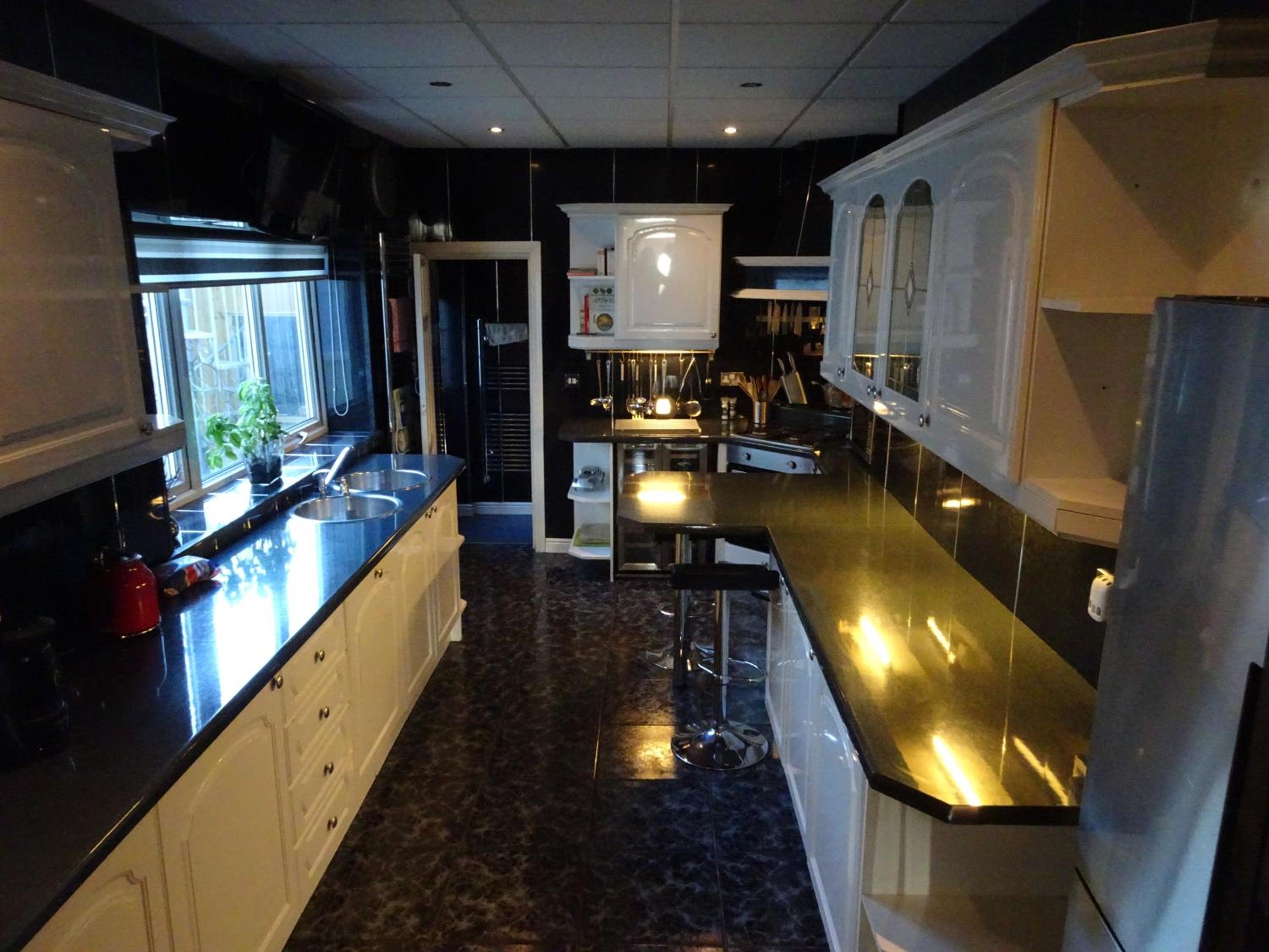 Three-Bedroom House - Photo 14